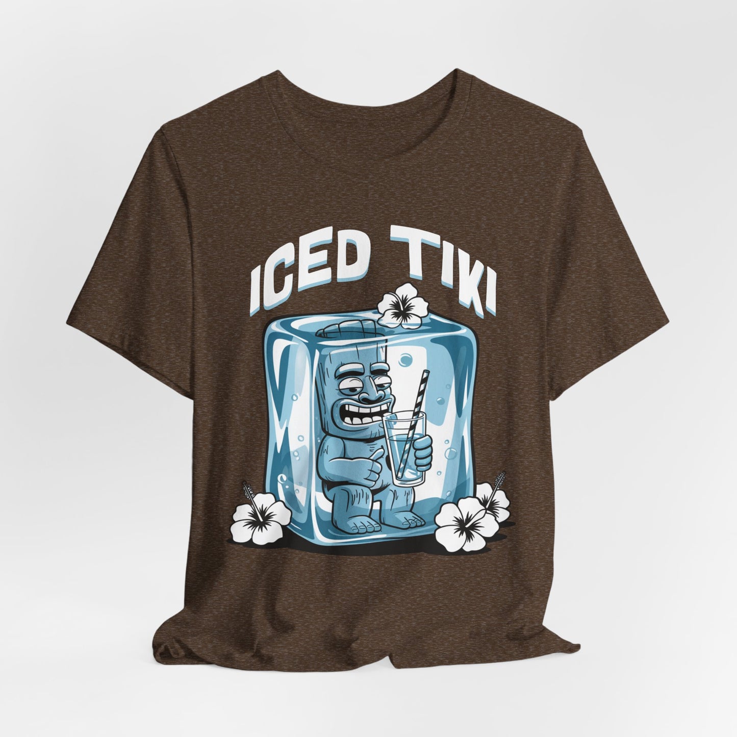 The Iced Tiki Unisex Jersey Tiki T-Shirt - Summer Vibes T-Shirt features a cartoon tiki face in an ice cube with a straw, white hibiscus flowers, and is made from breathable, lightweight fabric for comfort.