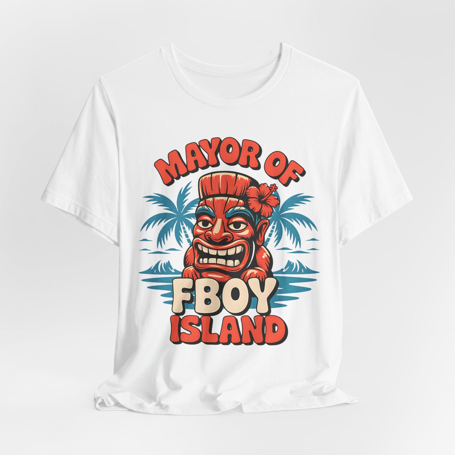 The Mayor of FBOY Island Short Sleeve Tiki T-Shirt features a cartoon tiki head with a red flower, palm trees, and water, plus bold colorful text—perfect for playful summer vibes and breathable comfort.