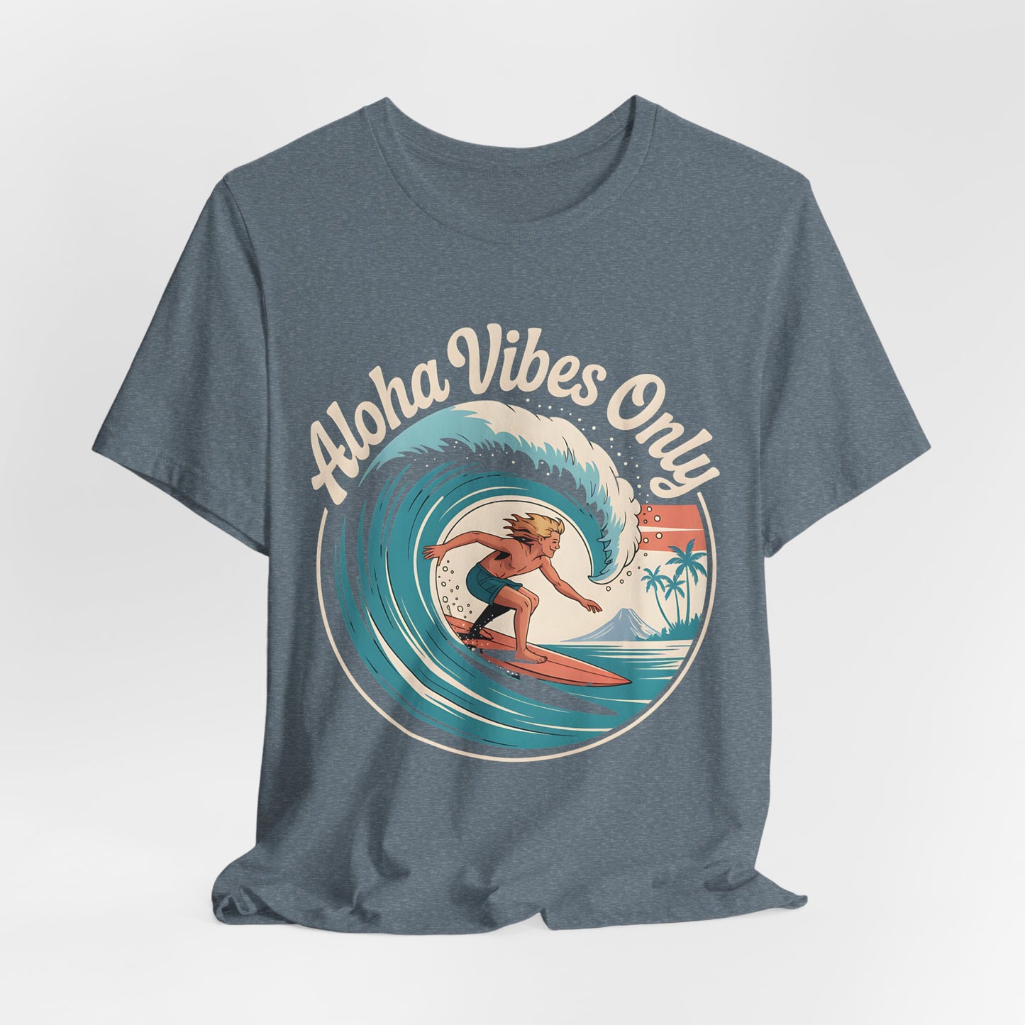The Aloha Vibes Only Surf T-Shirt is a blue unisex jersey tee with a surfer, palm trees, and sunset graphic. Features “Aloha Vibes Only” text—ideal for beach lovers.