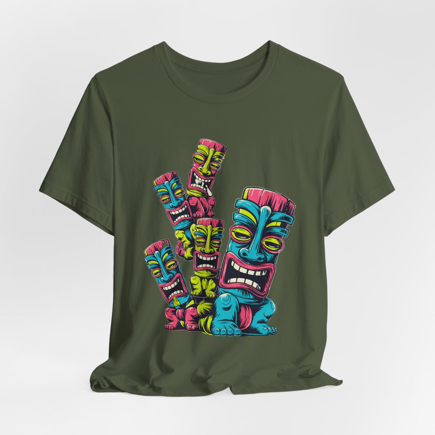 The Vibrant Tiki Art Unisex Jersey Tiki T-Shirt features five stacked tiki masks in blue, pink, yellow, and green on olive green. Made with breathable fabric and DTG printing for long-lasting comfort and vivid colors. Perfect for fun, casual style!.
