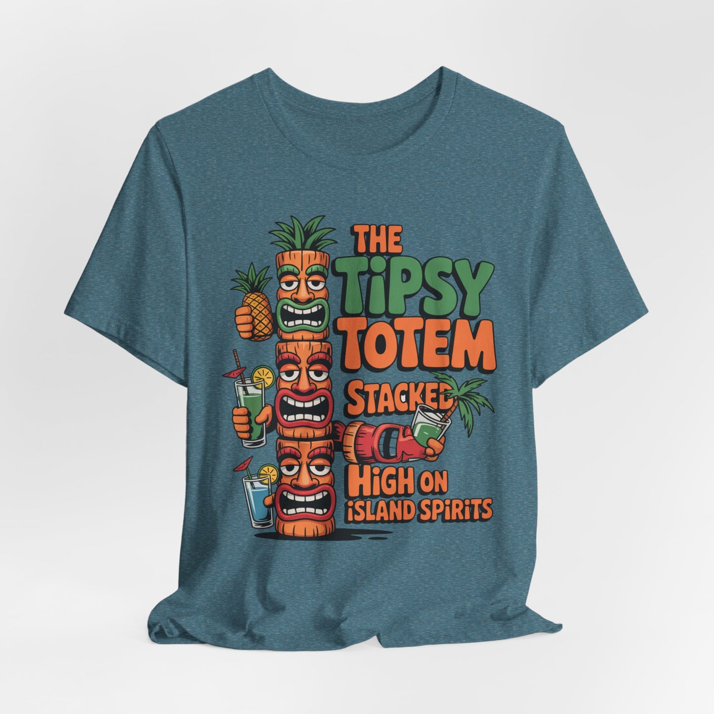 The Tiki Cocktail Tee - The Tipsy Totem Graphic Shirt showcases three colorful tiki totems with funny faces, tropical drinks, and pineapples. Features the text: The Tipsy Totem Stacked High on Island Spirits—ideal for summer parties.