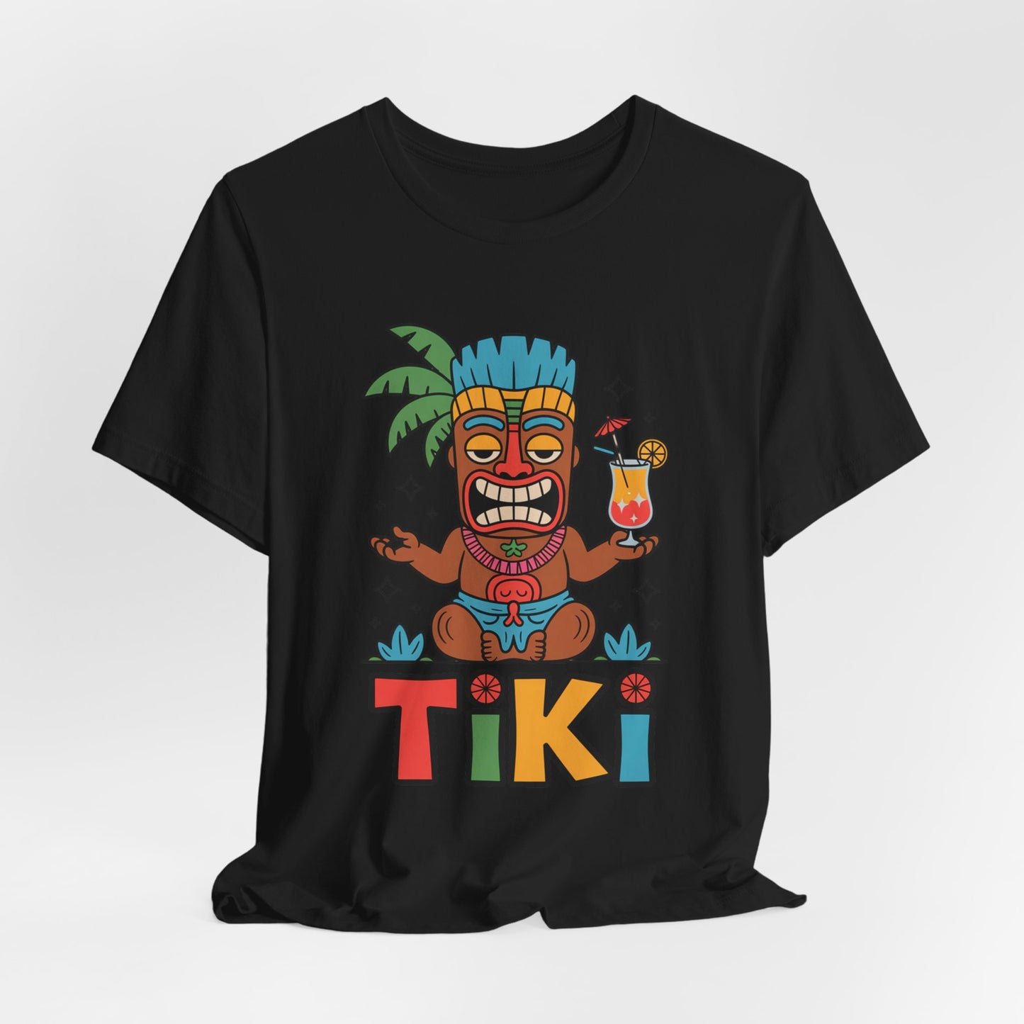 The Tiki Party Unisex Jersey Tiki T-Shirt - Tropical Vibe Graphic T-Shirt features a vibrant tiki figure with a drink, bold TIKI lettering, palm backdrop, and eco-conscious production—perfect for summer parties.