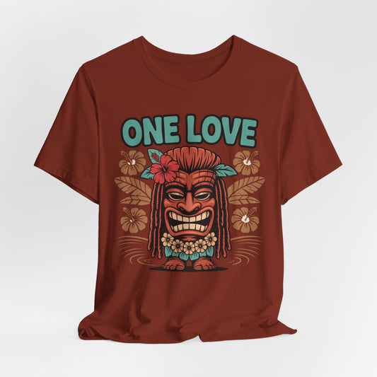 Ideal for festivals or the beach, the One Love Tropical Unisex Jersey Tiki T-Shirt showcases a colorful tiki mask, bold ONE LOVE text, and vibrant floral accents for a fun, summery vibe.