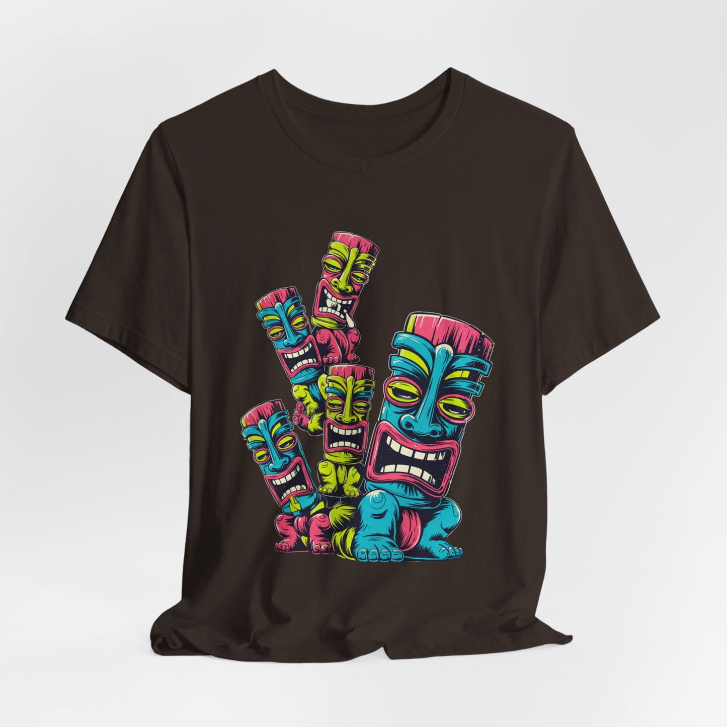 The Vibrant Tiki Art Unisex Jersey Tiki T-Shirt features a colorful graphic of five stacked tiki masks, printed with DTG techniques on breathable black fabric for fun, all-day comfort.
