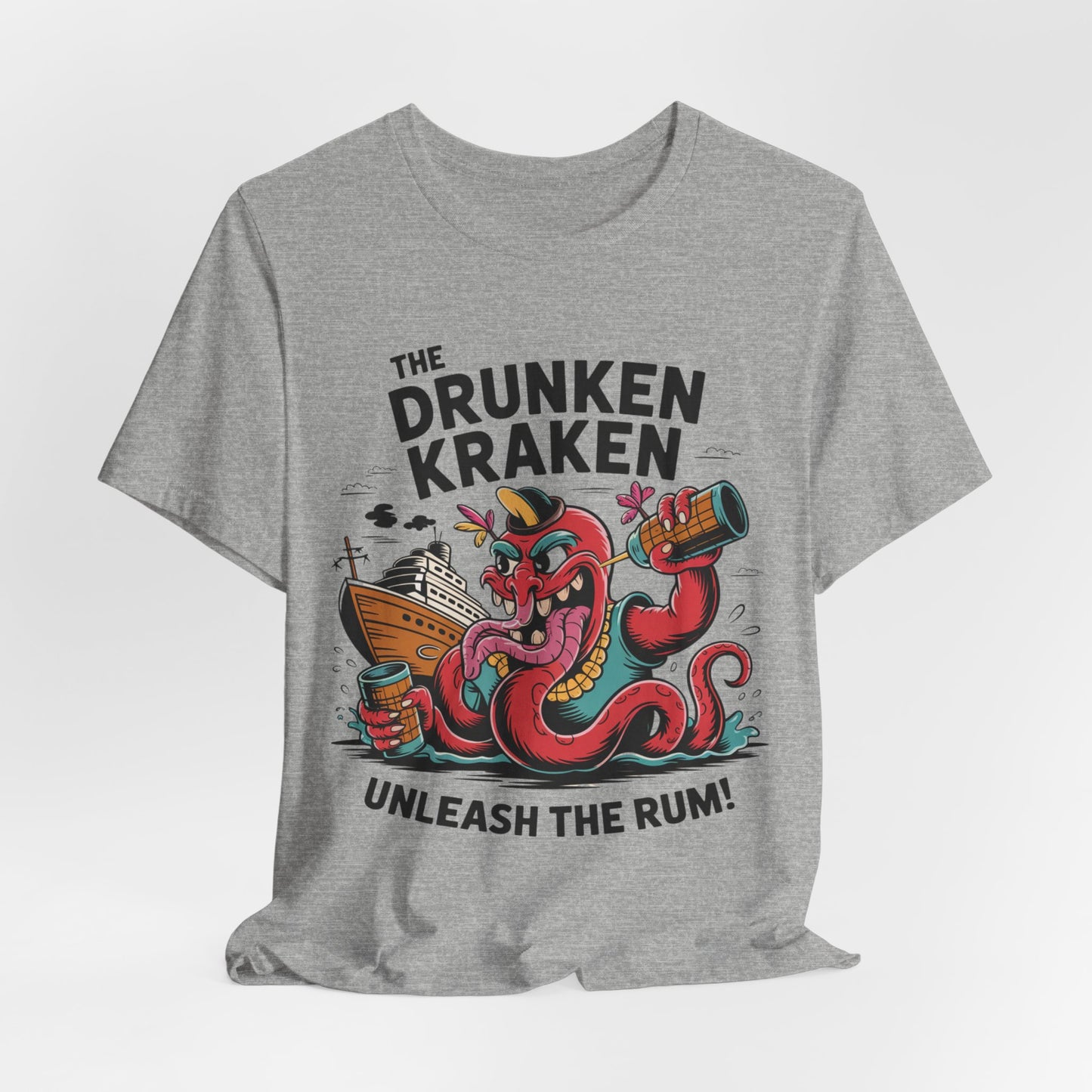 The Drunken Kraken Unisex Tiki T-Shirts - Unleash the Rum Graphic features a gray short sleeve tee with a cartoon red kraken holding a ship and rum mug. “The Drunken Kraken” and “Unleash the Rum!” are printed around the illustration. Perfect for summer fun!.