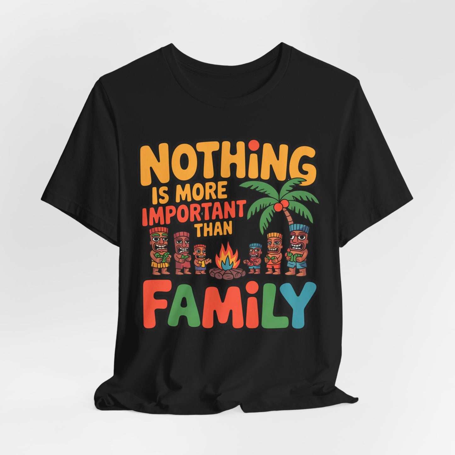 The Family Tiki Tee - Nothing is More Important Than Family Unisex T-Shirt features colorful text above and below cartoon tiki figures, a palm tree, and a campfire on a black shirt.