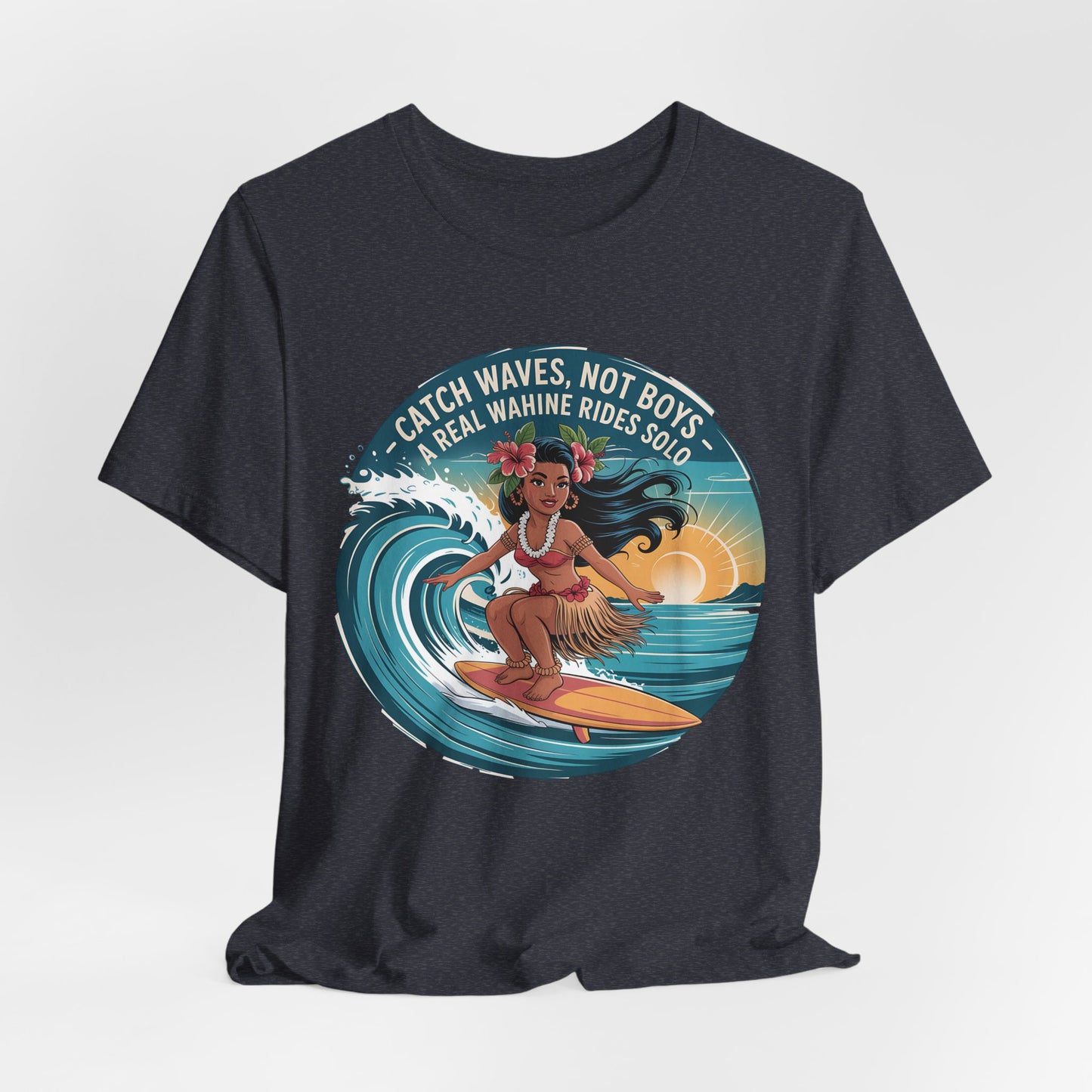 The Catch Waves Not Boys Wahine T-Shirt is perfect for beach lovers, featuring a surfing woman in a grass skirt and flower lei with the text: “Catch Waves, Not Boys. A Real Wahine Rides Solo.”.