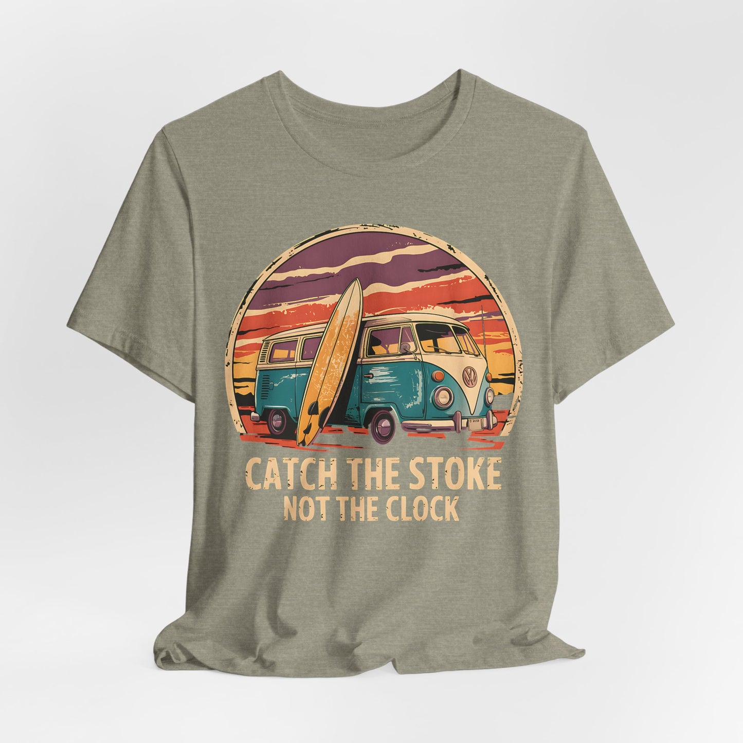 The Catch the Stoke Surf Tee - Unisex Jersey Short Sleeve T-Shirt in khaki showcases a retro teal van, surfboard, and sunset graphic with the slogan CATCH THE STOKE NOT THE CLOCK, made from soft, breathable cotton.