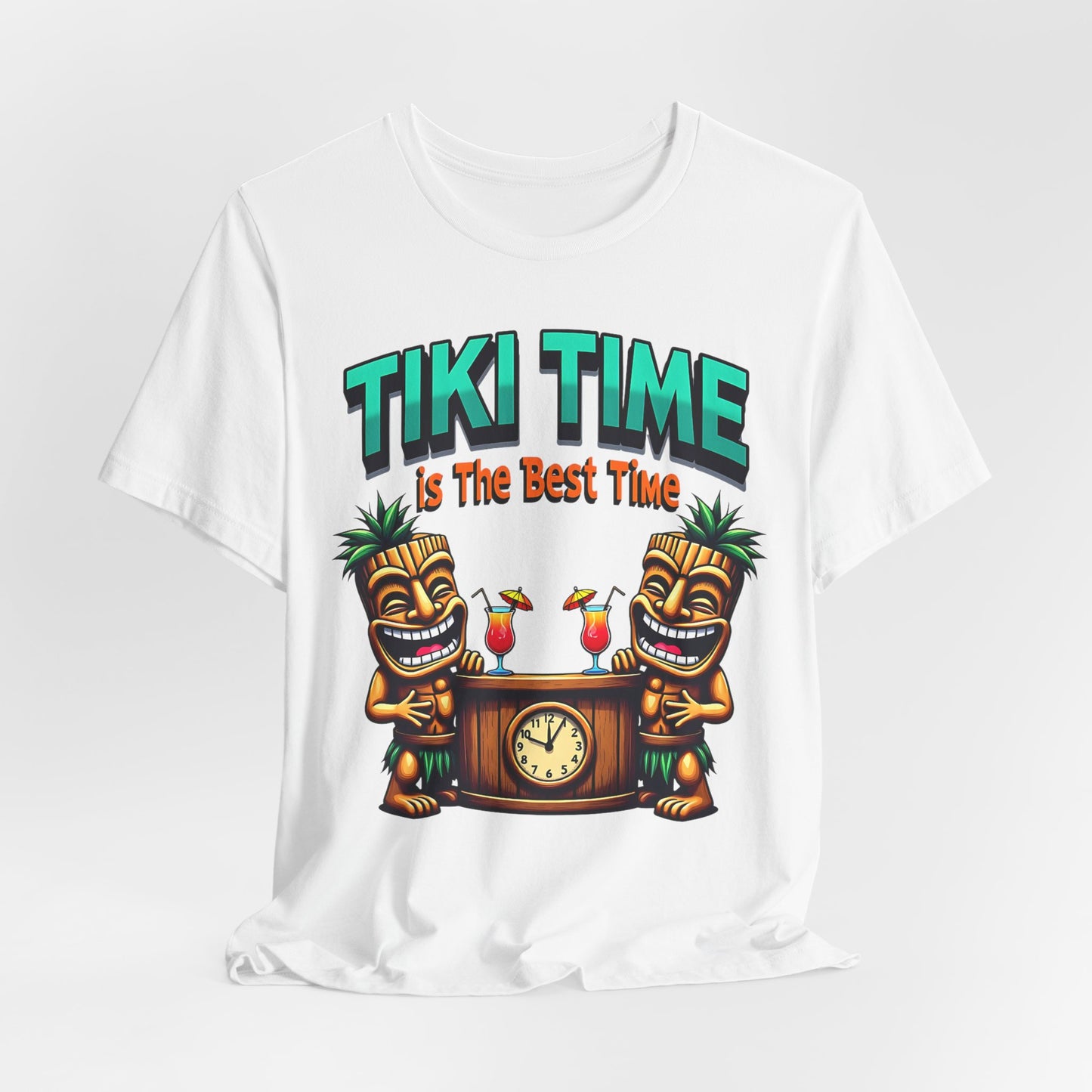 The Tiki Time Unisex Jersey T-Shirt features a vibrant tiki graphic with two smiling tikis, drinks, and a clock. “TIKI TIME” is above and “is The Best Time.” Made from soft Airlume combed cotton—perfect for beach lovers.