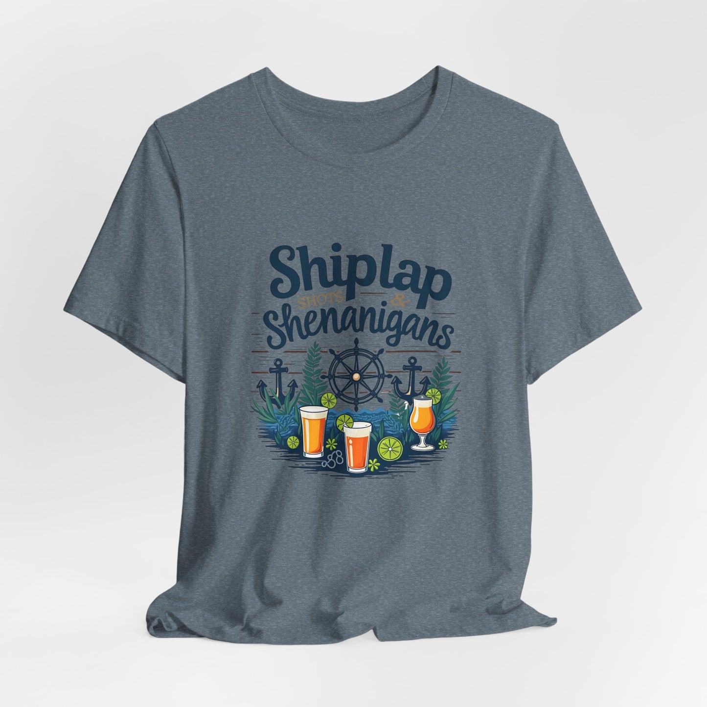 The Shiplap Shenanigans Unisex Short Sleeve Tee—ideal for brewery lovers—features nautical icons and the phrase Shiplap Shenanigans on Airlume combed, ring-spun cotton for a relaxed fit.