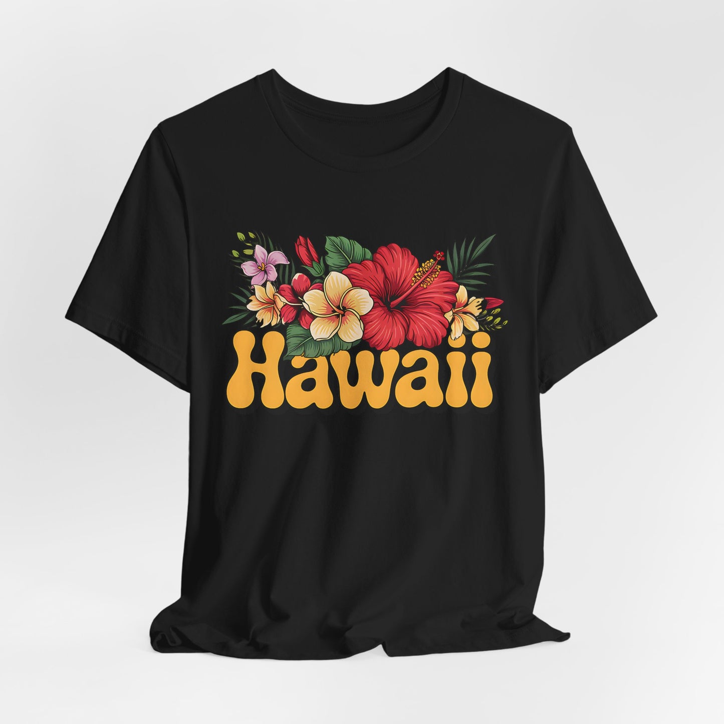The Hawaiian Floral Unisex Tee - Beach Vibes and Island Spirit is a black, premium Airlume cotton shirt featuring vibrant tropical flowers, lush green leaves, and bold yellow retro Hawaii lettering for a stylish island look.