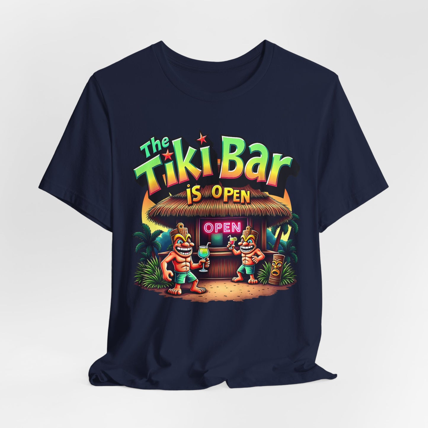The Tiki Bar Is Open Tiki T-Shirt - Summer Vibes Beachwear is a navy blue unisex tee made from soft Airlume combed and ring-spun cotton, featuring a colorful tiki bar graphic with cartoon characters, palm trees, and the phrase The Tiki Bar is Open.