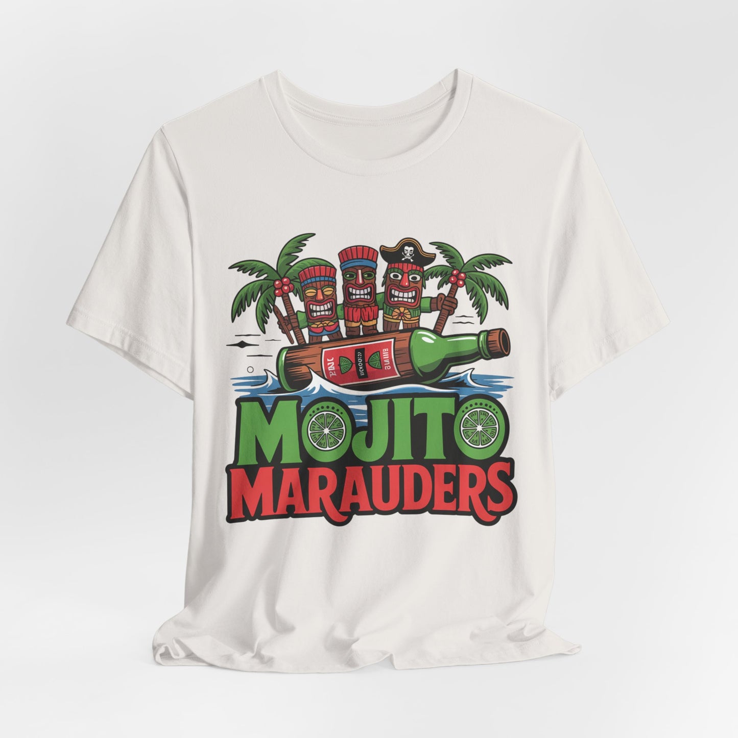The Mojito Marauders Tiki T-Shirt is a colorful unisex jersey tee featuring three cartoon tiki heads, pirate hat, rum bottle, palm trees, lime accents, and bold MOJITO MARAUDERS text—perfect for tropical vibes and vibrant comfort.