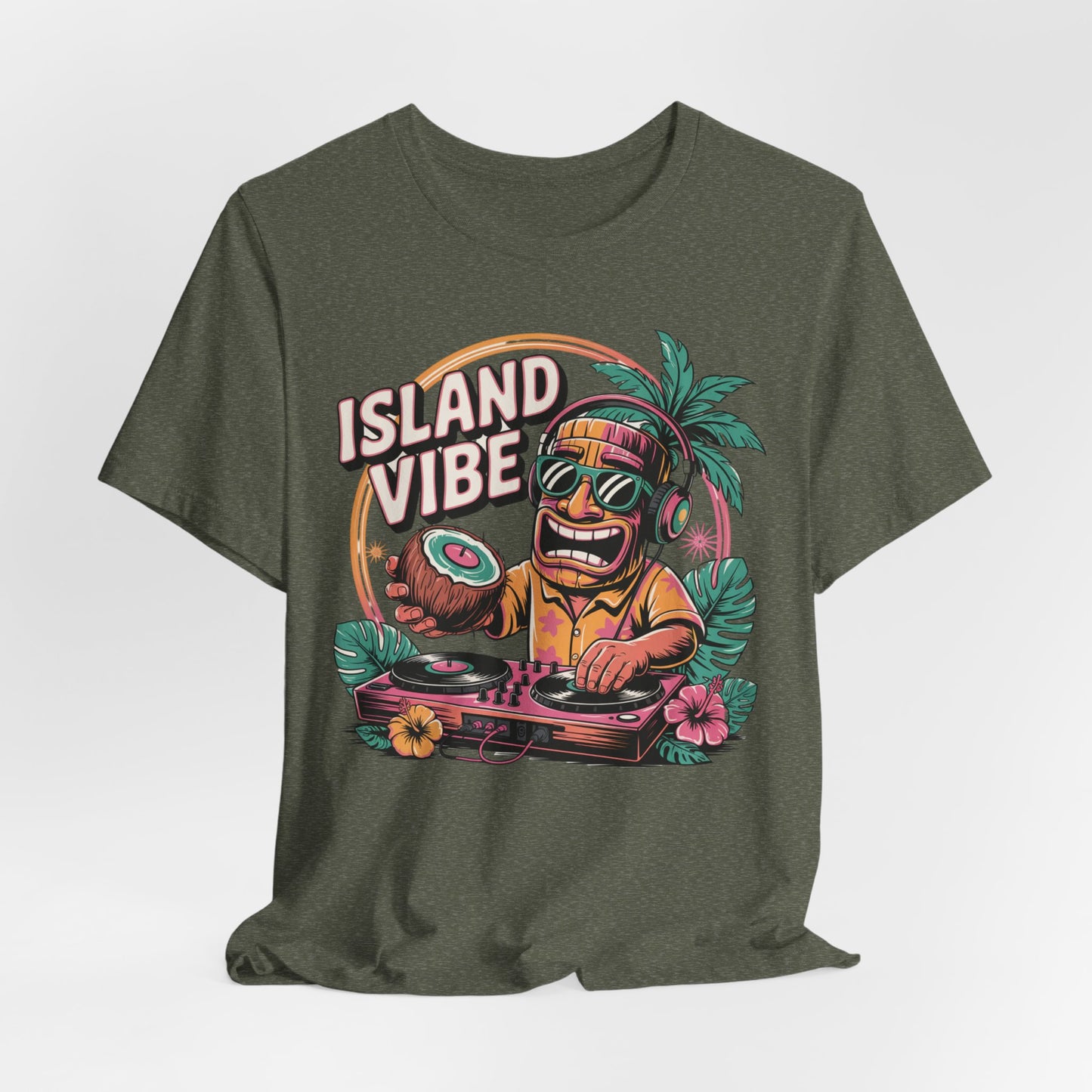 The Island Vibe DJ Short Sleeve Tiki T-Shirt for Music Lovers in dark green features a vibrant cartoon tiki DJ with tropical flowers and ISLAND VIBE text, crafted from soft Airlume cotton—ideal for summer gatherings.