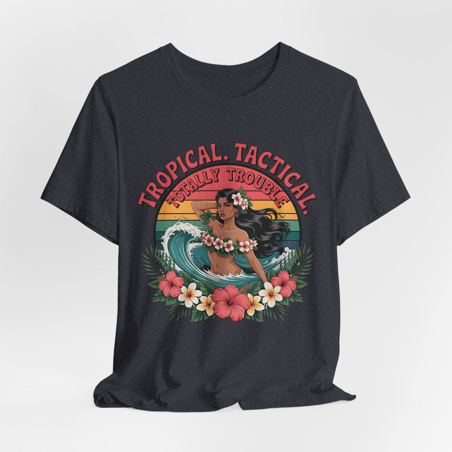 The Tropical Tactical Unisex Jersey T-Shirt - Aloha Vibes & Summer Fun features a black tee with a hula dancer, tropical flowers, ocean waves, and sunset, plus bold Tropical Tactical and Totally Trouble! graphics. Made from soft Airlume combed cotton.
