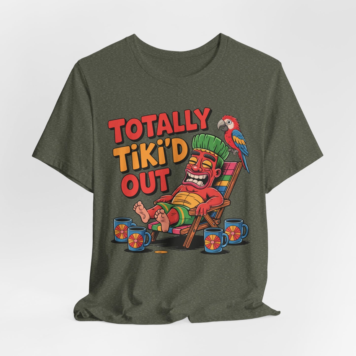 The Tiki Vibe Short Sleeve Tee - Totally Tikid Out Graphic is a green unisex shirt for tiki lovers, featuring a vibrant cartoon of a relaxed tiki statue with drinks and a parrot, plus bold TOTALLY TIKI’D OUT text—perfect for your laid-back vibe!.