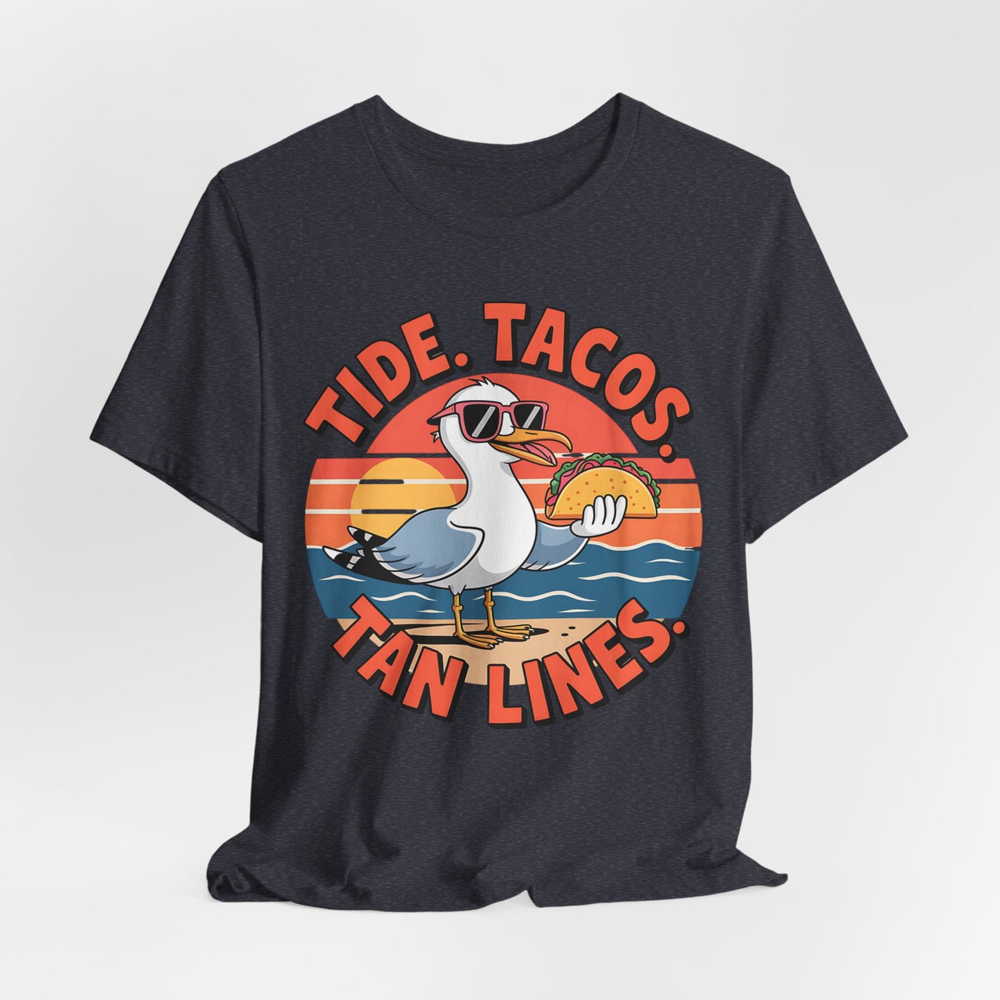 The Beach Vibes Unisex T-Shirt - Tide, Tacos, Tan Lines Summer Shirt features a cartoon seagull with sunglasses holding a taco at sunset, with bold retro lettering—making it the perfect summer vacation tee.