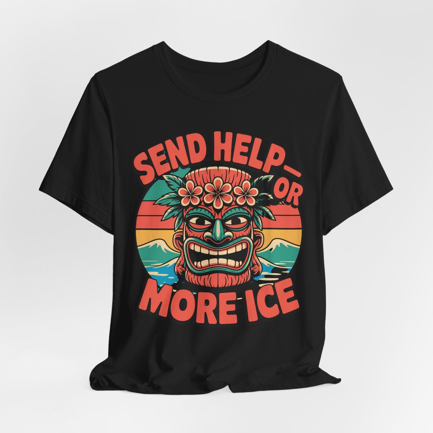 The Tropical Vibe Unisex Tiki T-Shirt features a colorful tiki mask with flowers, waves, and sunset under Send Help or More Ice in bold red-orange—perfect for summer festivals and laid-back tropical style.