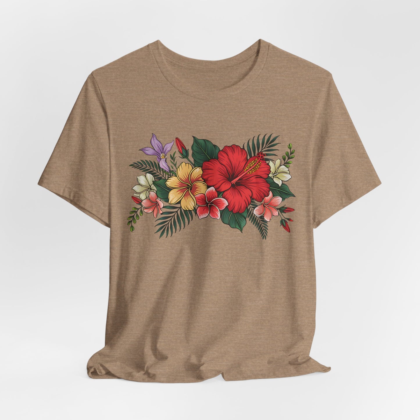 The Tropical Floral Unisex T-Shirt - Vibrant Summer Style in brown is made from soft Airlume cotton, showcasing a bright chest print of red, yellow, and purple flowers with lush green leaves.