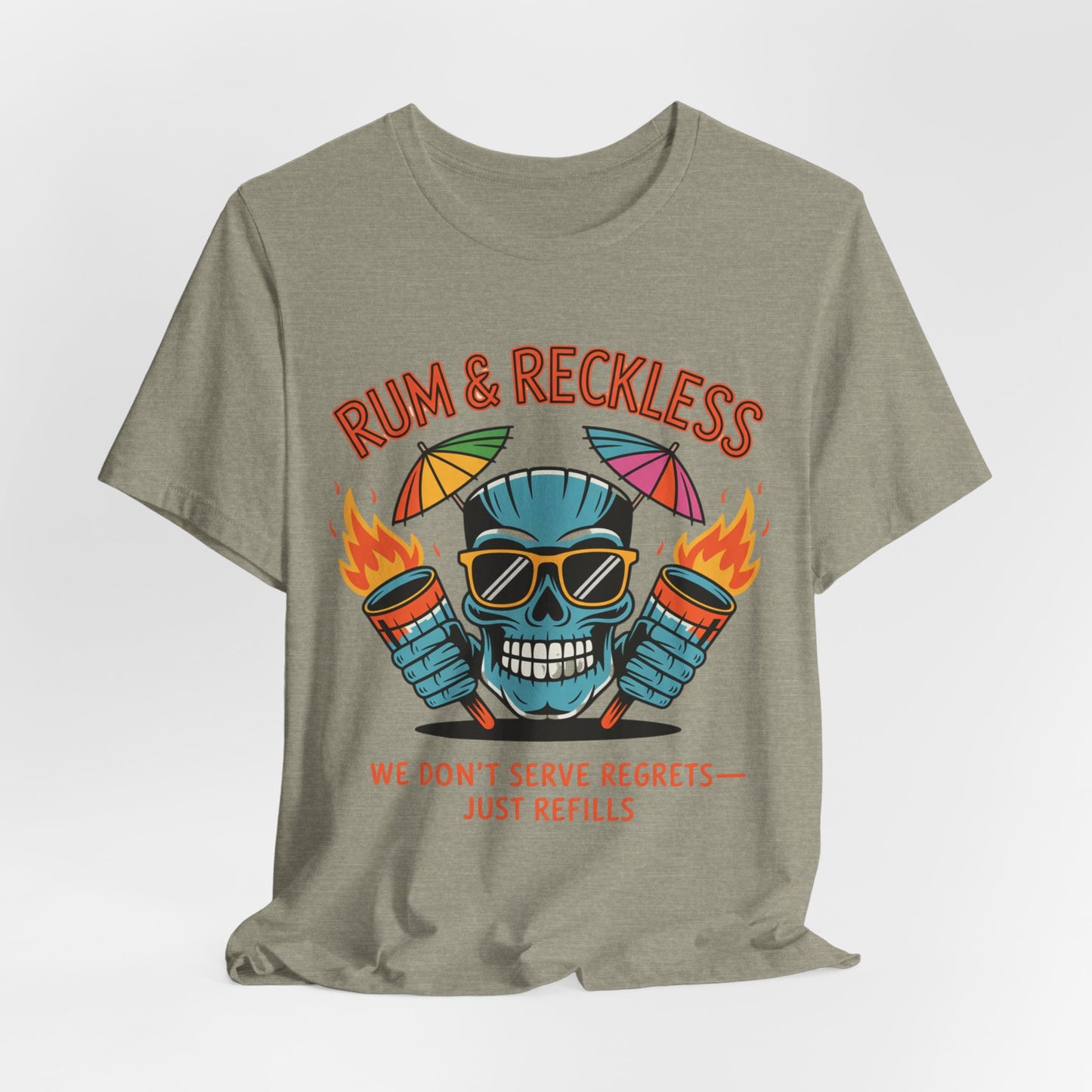 The Rum & Reckless Skull Tiki T-Shirt is a gray unisex tee featuring a grinning skull in sunglasses holding flaming drinks, umbrellas above, with RUM & RECKLESS. WE DONT SERVE REGRETS—JUST REFILLS. Perfect for summer parties and beach days!.