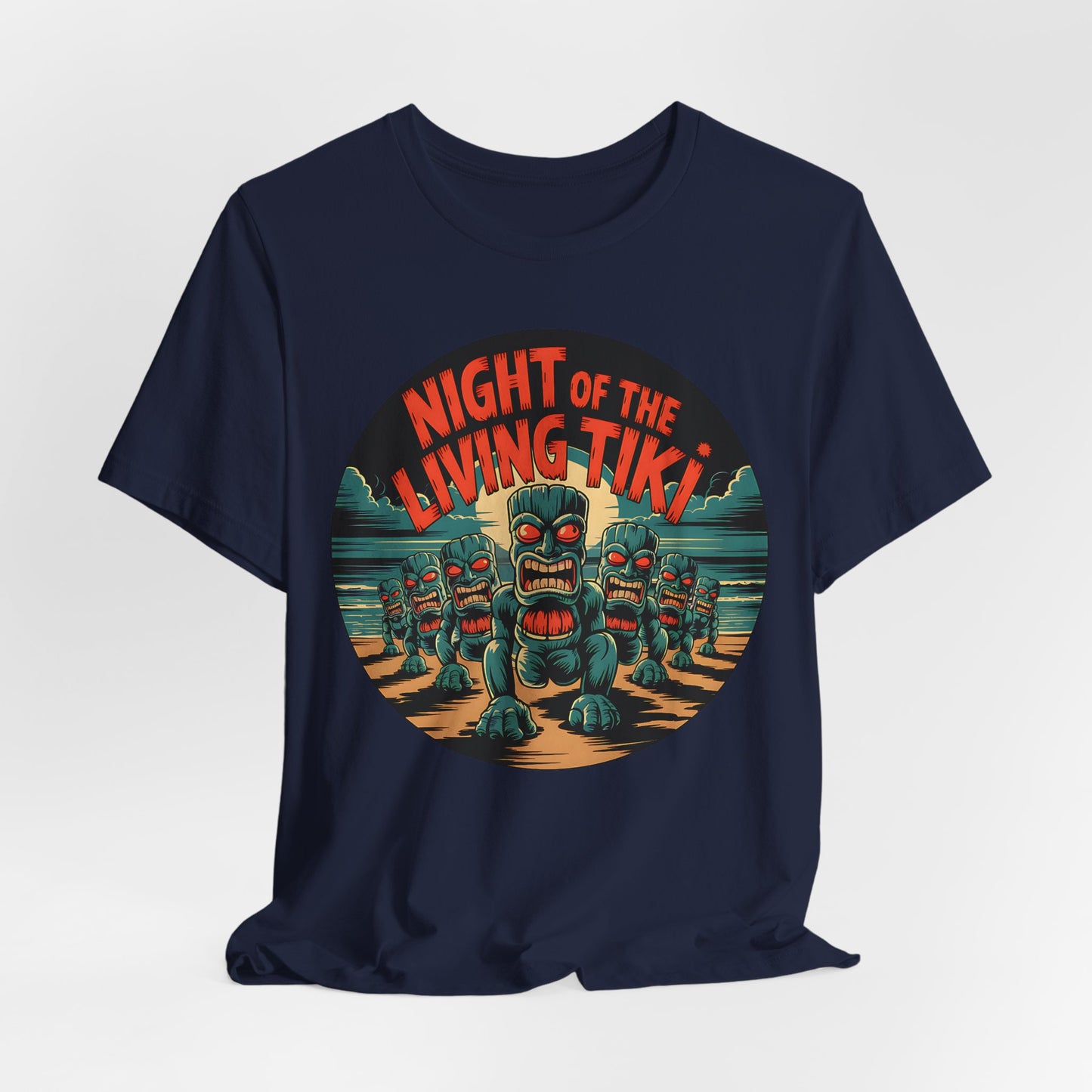 Navy blue t-shirt with 'Night of the Living Tiki' graphic design on a white background
