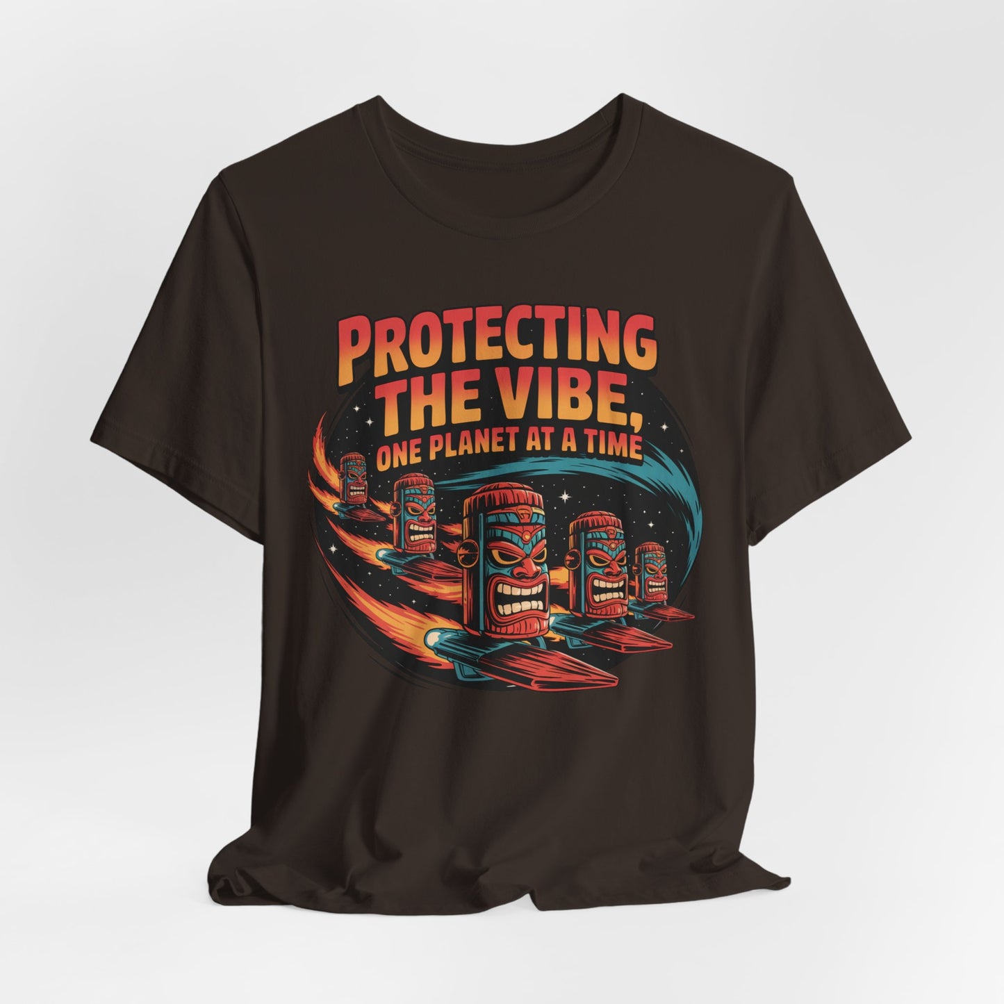 The Protecting the Vibe Unisex Tiki T-Shirt is an eco-friendly black tee featuring colorful tiki faces, surfboards, and “Protecting the Vibe, One Planet at a Time” in retro lettering—perfect for those with cosmic style and eco-conscious values.