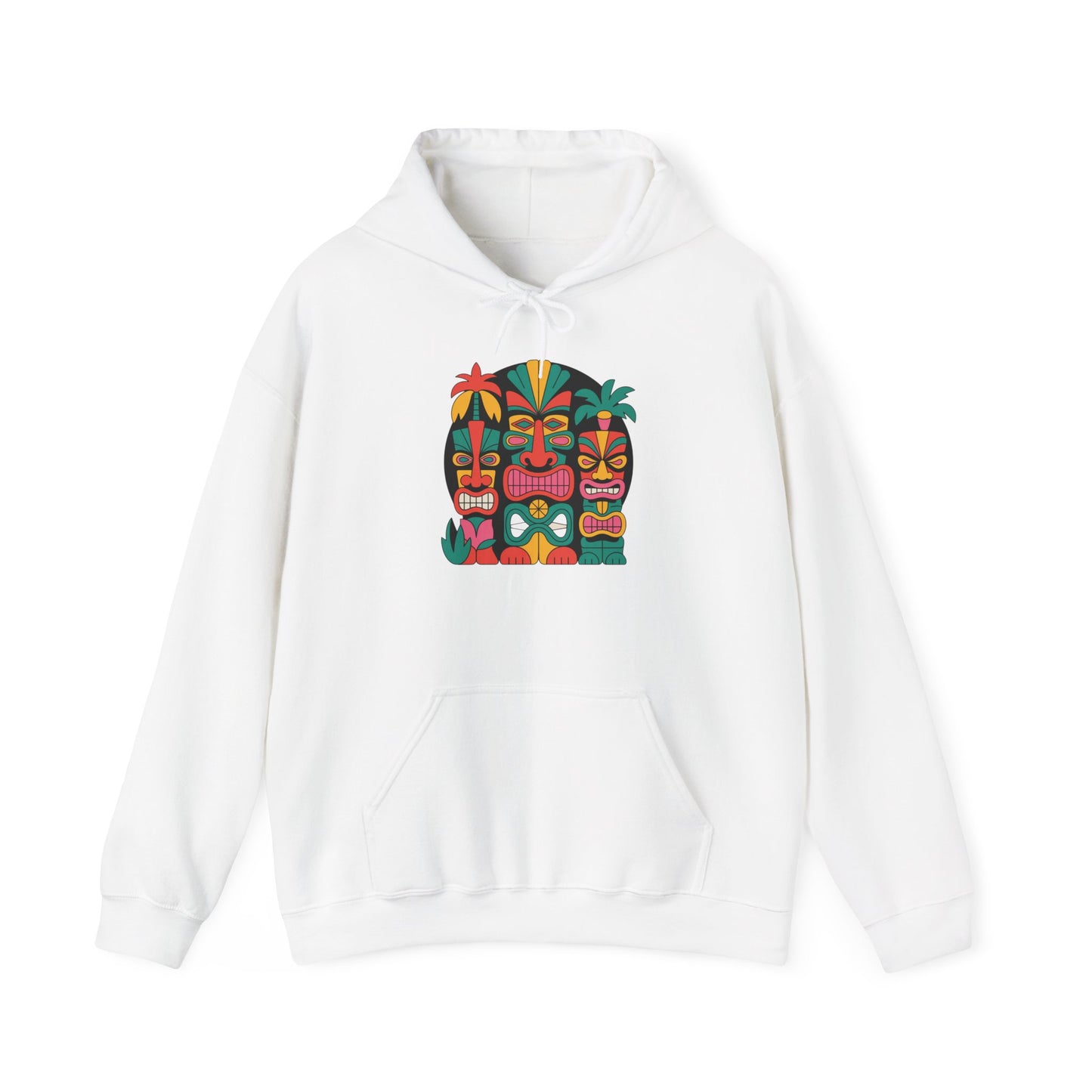 The Tropical Vibe Tiki Hooded Sweatshirt - Unisex Heavy Blend™ is a white hoodie with three colorful tiki-style faces and tropical plants on the chest, plus a cozy kangaroo pocket for comfort.