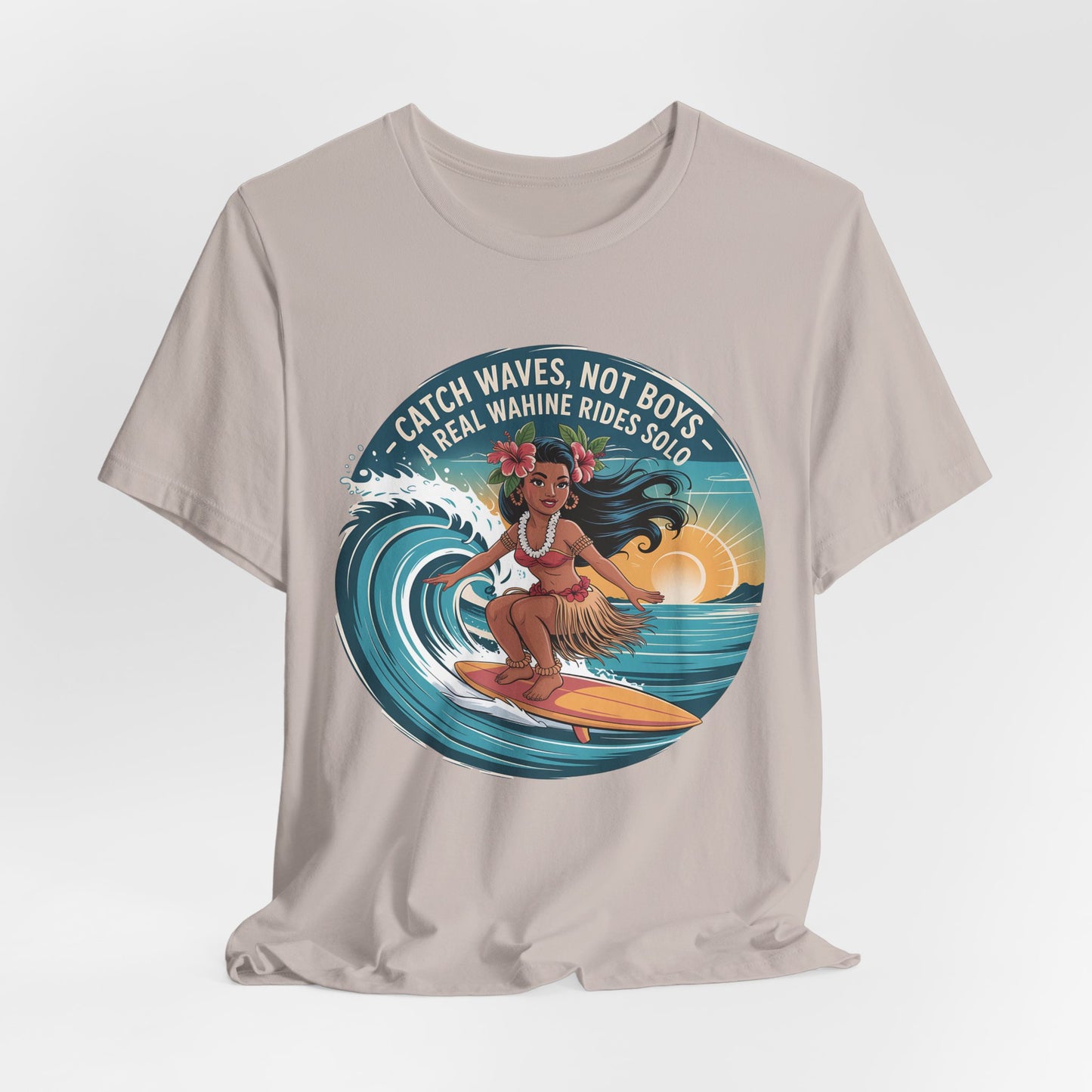 The Catch Waves Not Boys Wahine T-Shirt features a surfing woman in a hula skirt with a sunset. Perfect for beach lovers, it displays the phrases “Catch Waves, Not Boys” and “A Real Wahine Rides Solo.”.