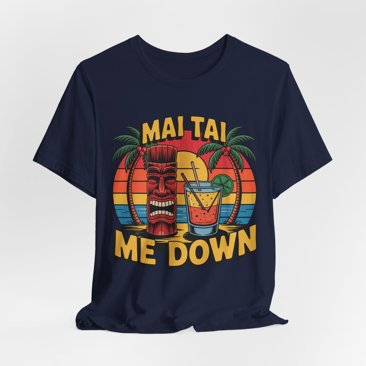 The Mai Tai Me Down Unisex Tiki T-Shirt features soft Airlume cotton and a tropical design with sunset, palm trees, tiki mask, and Mai Tai cocktail beneath bold yellow MAI TAI ME DOWN text—perfect for summer vibes.