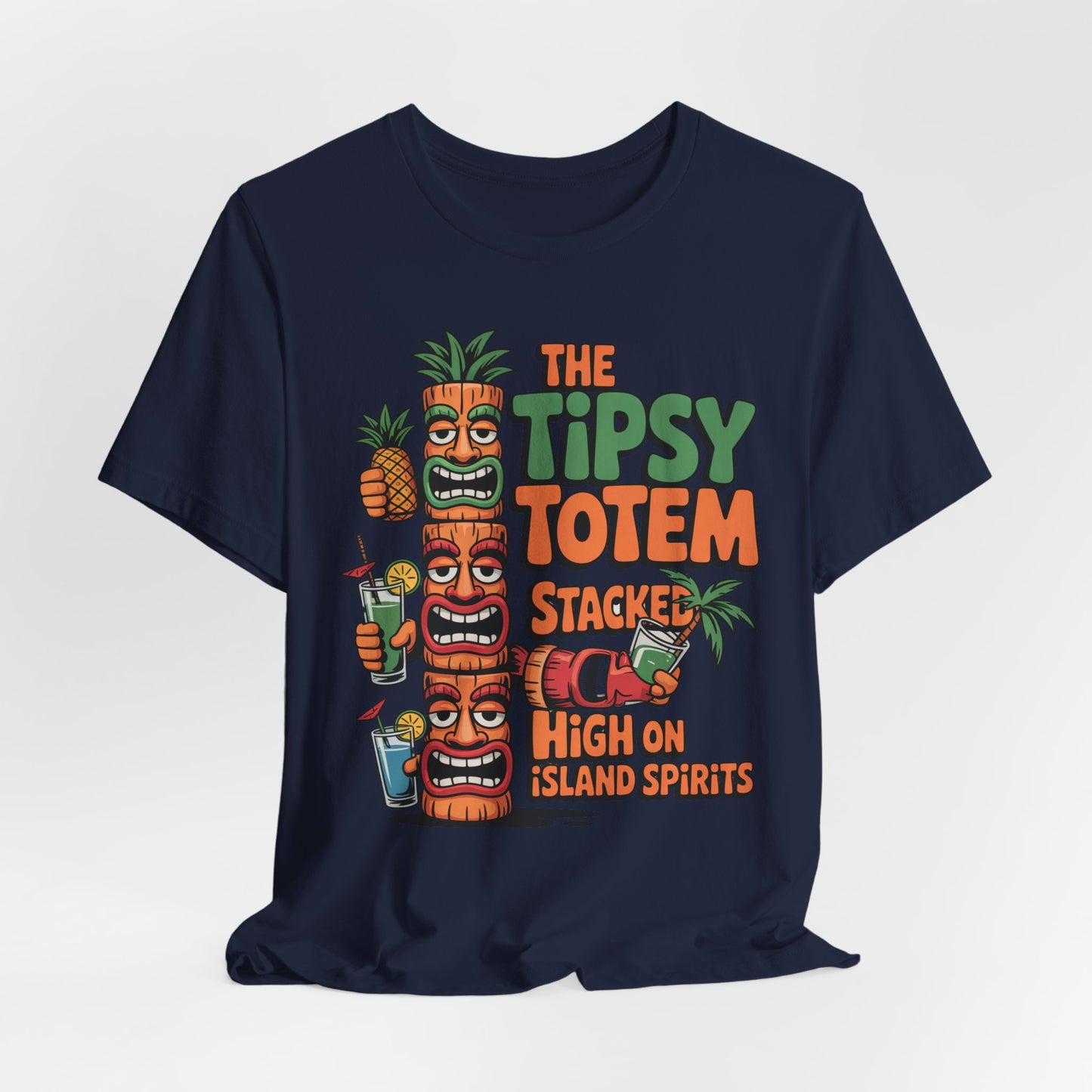The Tiki Cocktail Tee - The Tipsy Totem Graphic Shirt features colorful cartoon tiki totems with cocktails and pineapples plus The Tipsy Totem Stacked High on Island Spirits text—perfect for summer parties and a tropical vibe.