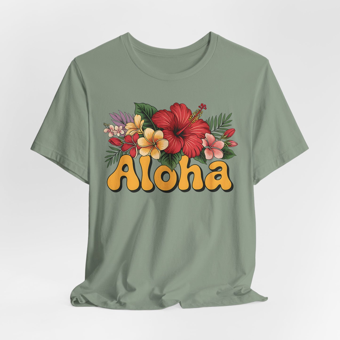 The Aloha Floral Unisex Jersey T-Shirt - Tropical Vibes, Casual Summer Style features a sage green color, vibrant tropical flower and leaf design above bold yellow “Aloha,” and is crafted from soft Airlume cotton.