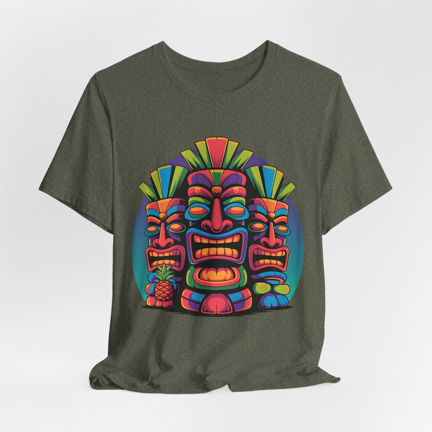 The Vibrant Tribal Mask Tiki T-Shirt - Unisex Short Sleeve showcases three bold tiki faces with tropical pineapples and leaves in a striking design—a perfect pick for any casual wardrobe.
