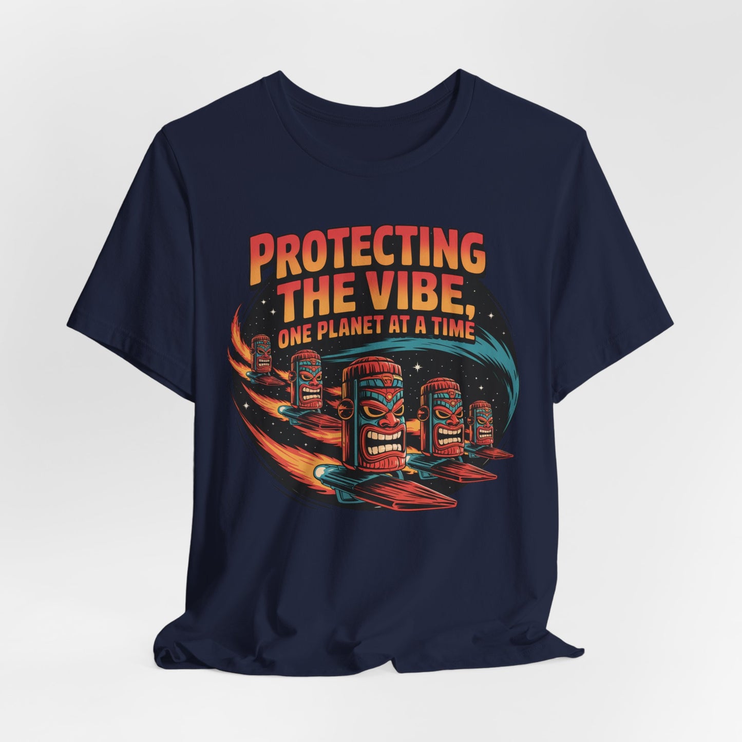 The Protecting the Vibe Unisex Tiki T-Shirt is a navy eco-friendly tee featuring tiki-style surfers in space and bold orange/yellow text—perfect for those who love unique graphic shirts.