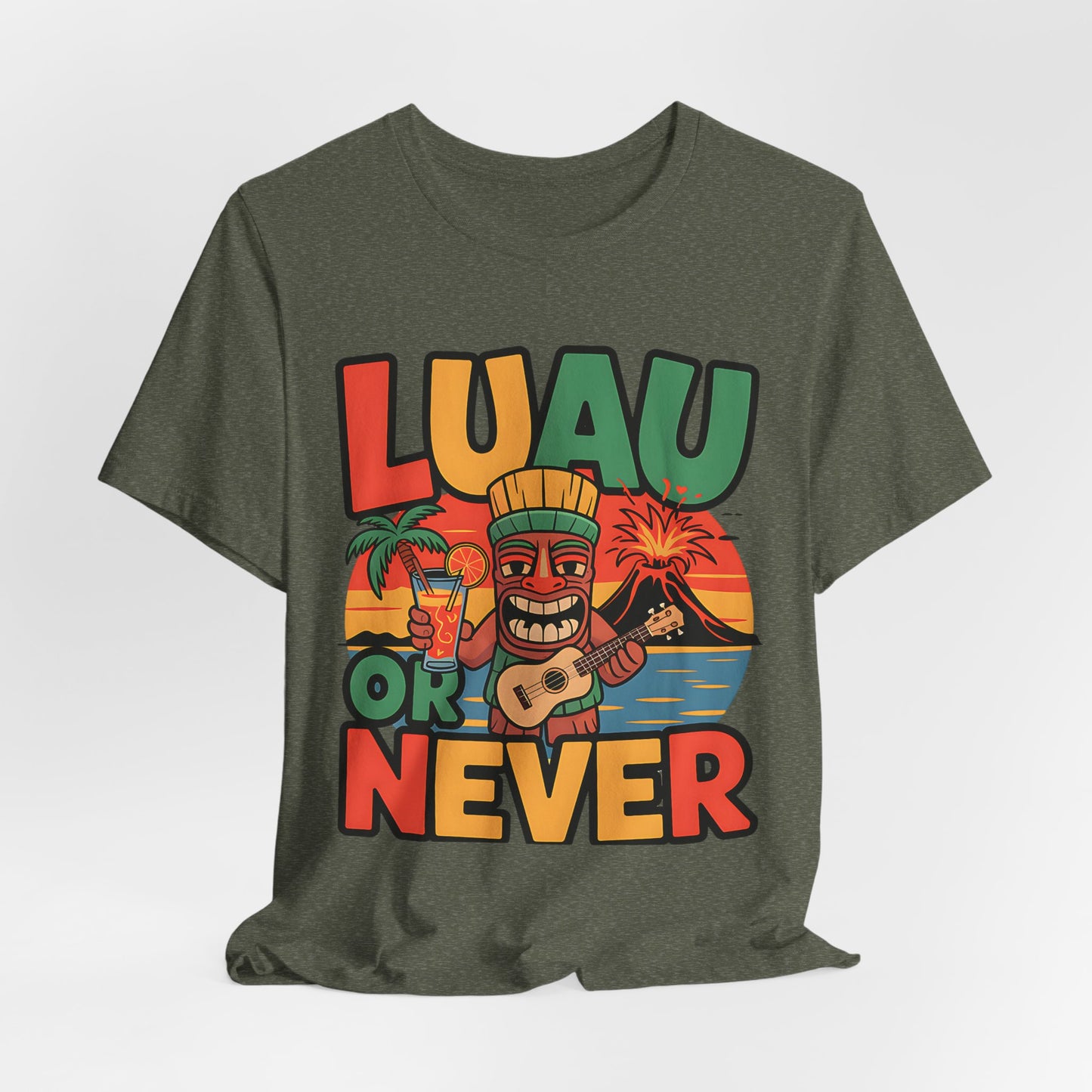 The Tropical Luau Short Sleeve Tiki T-Shirt features a vibrant tiki statue playing guitar, tropical drink, palm trees, volcano, and sunset with bold LUAU OR NEVER text—an ideal green unisex tee for summer celebrations and island vibes.