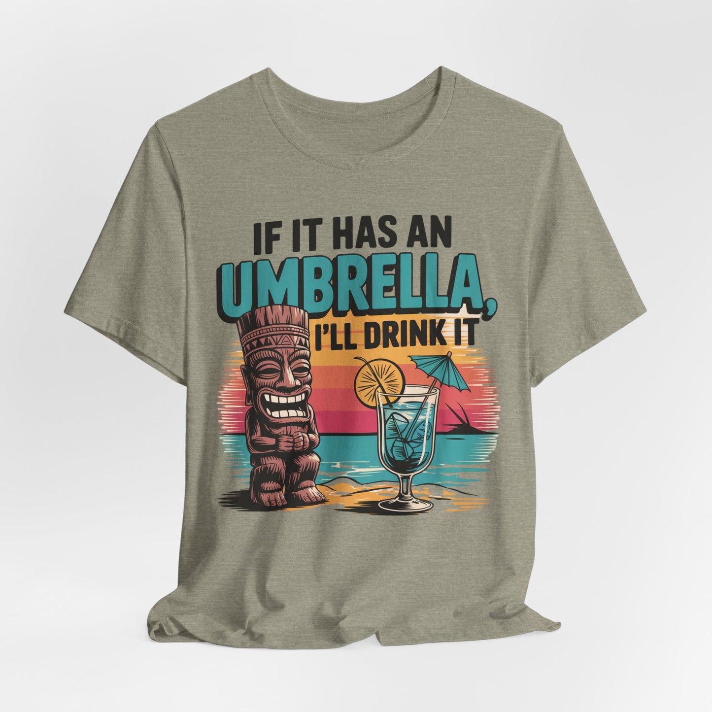 Show your love for beach vibes with the Tropical Fun Tiki T-Shirt—featuring a colorful tiki statue, tropical drink, and playful If It Has an Umbrella, Ill Drink It text. Perfect unisex tee for fun, laid-back summer style!.