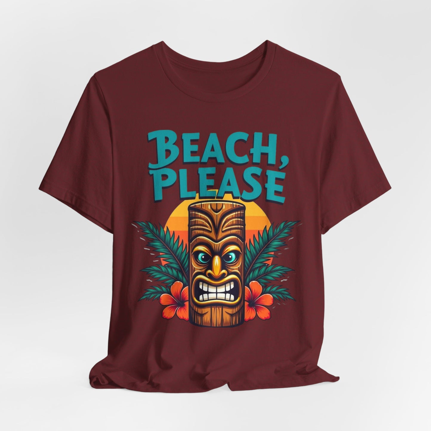 The Beach Please Unisex Short Sleeve Tiki T-Shirt - Summer Vibe Tee features a maroon design with a colorful tiki face, tropical leaves, red hibiscus flowers, a sunset backdrop, and fun BEACH PLEASE text—ideal for summer holidays.