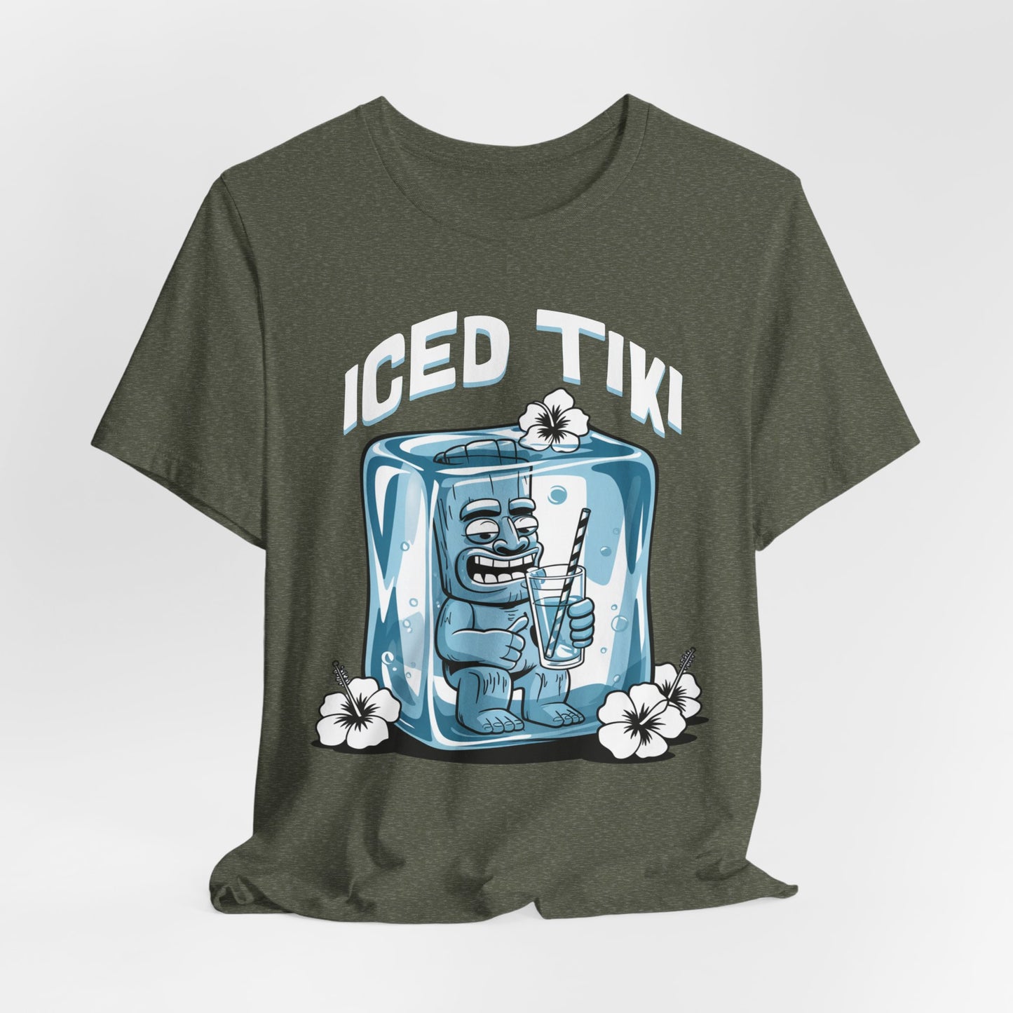 The Iced Tiki Unisex Jersey Tiki T-Shirt – Summer Vibes features a cartoon Tiki statue in an ice cube with white hibiscus flowers and “ICED TIKI” above. This dark green tee is made from lightweight, breathable fabric for all-day comfort.