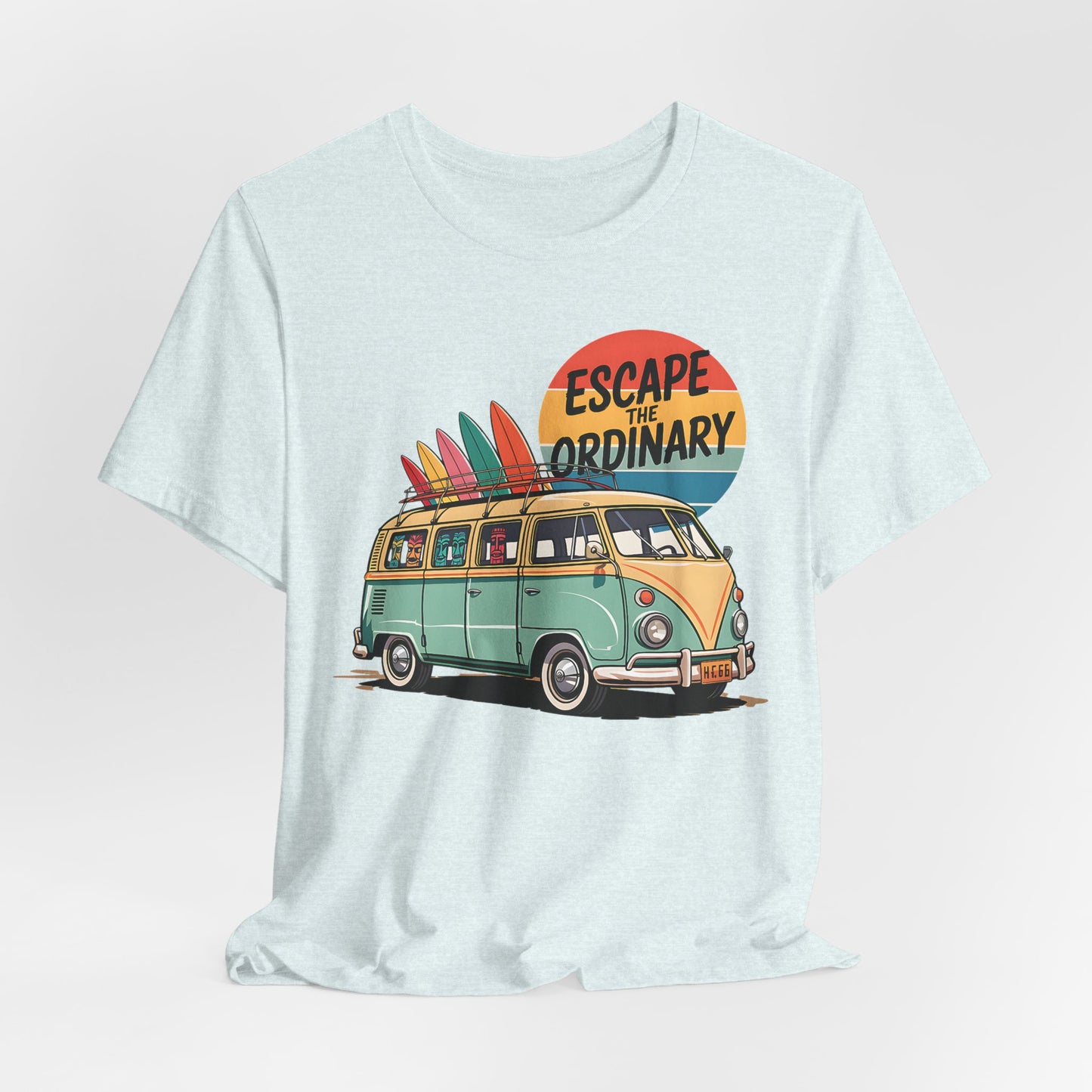 The Escape the Ordinary Surf Tee is a unisex jersey short sleeve t-shirt in light blue, featuring a retro van with surfboards and “ESCAPE THE ORDINARY” against a red sunset—perfect for summer festivals.