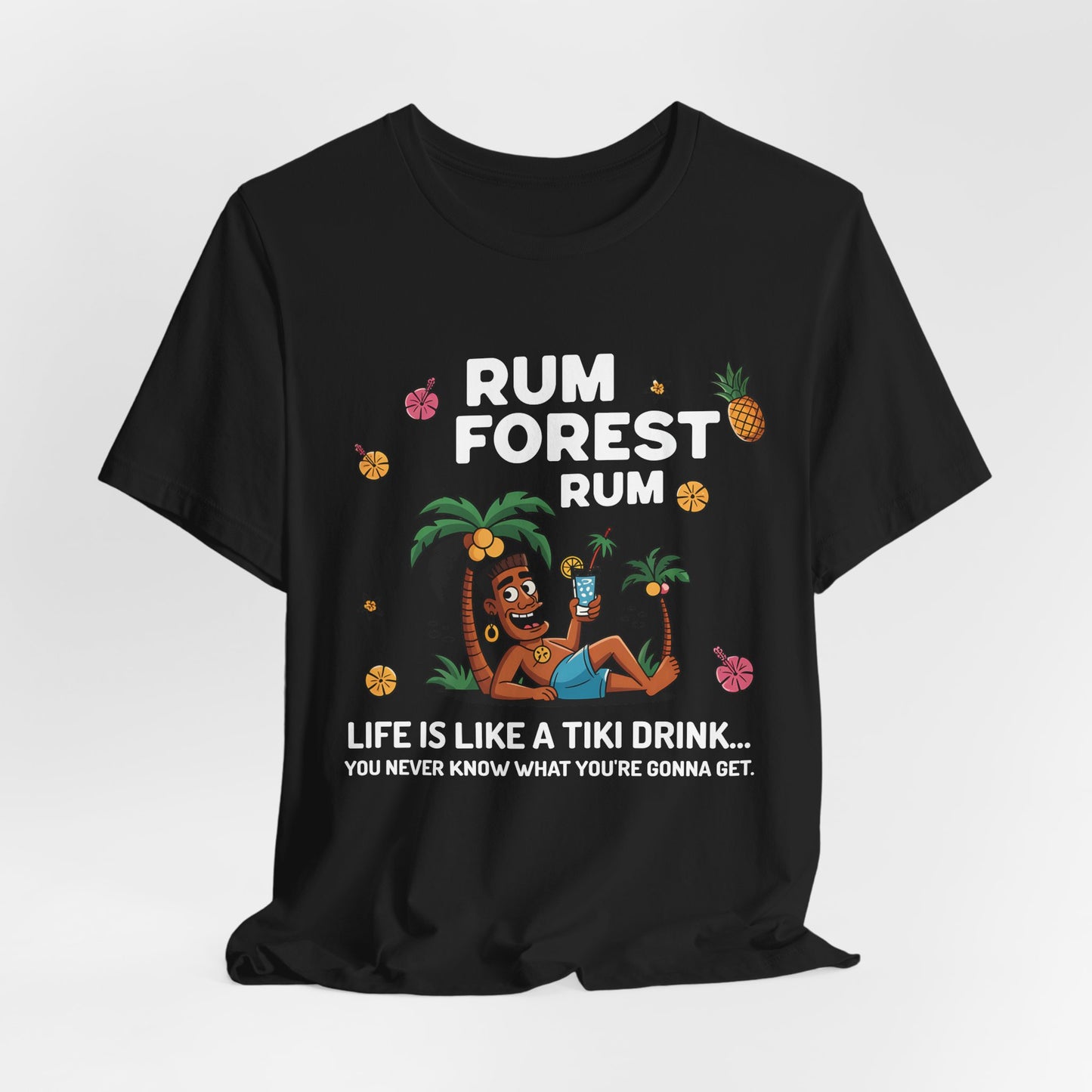 Black unisex T-shirt featuring a relaxed man holding a drink, palm trees, pineapples & flowers. Text: Life Is Like A Tiki Drink. Perfect for fans of tropical vibes and beach vacation style.