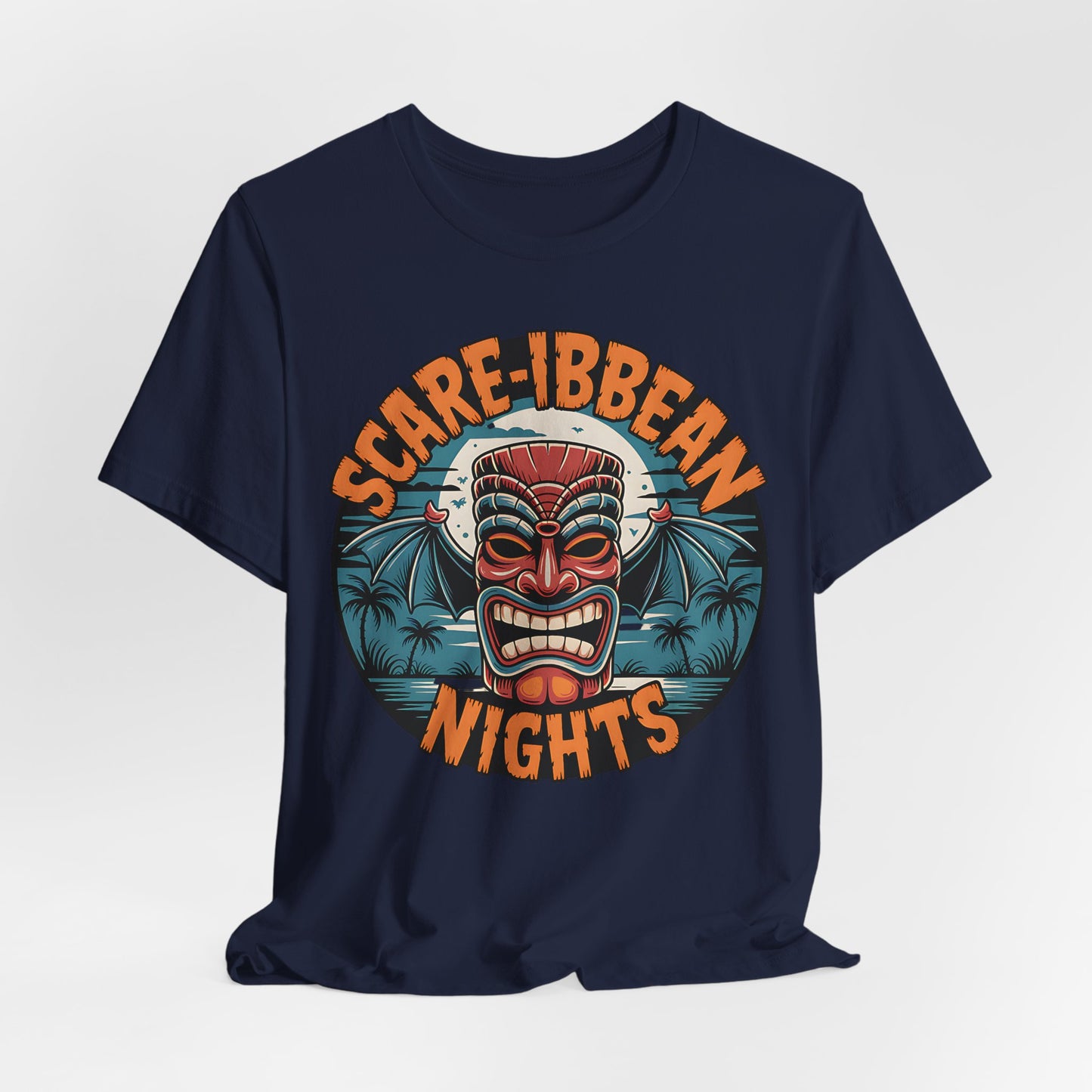 Navy blue t-shirt with a colorful graphic of a mask and text 'SCARE-IBBEAN NIGHTS' on a white background