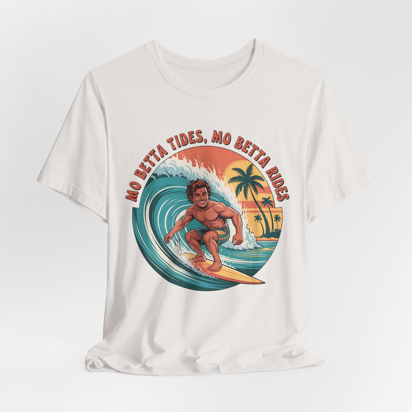 The Surfing Graphic T-Shirt - Mo Betta Tides, Mo Betta Rides features a smiling surfer on a large wave with palm trees and a sunset, plus bold red slogan text—ideal for beach holidays and summer fun.