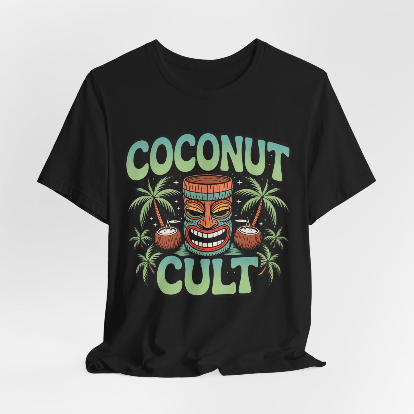 The Coconut Cult Unisex Jersey Tiki T-Shirt features vibrant green and blue text with a tiki mask, coconuts, and palm trees—tropical vibes perfect for any beach lover or your next beach party.