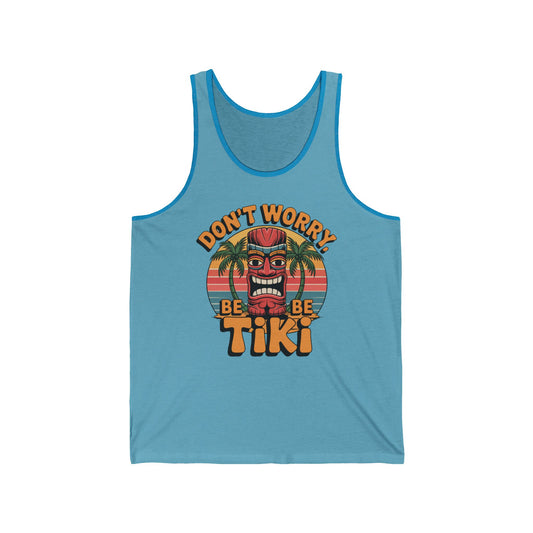 Embrace island vibes with the Tiki Vibe Tank Top—a blue tank featuring a vibrant tiki mask, palm trees, sunset graphic, and DONT WORRY, BE TIKI text. Perfect for fans of beach culture!.
