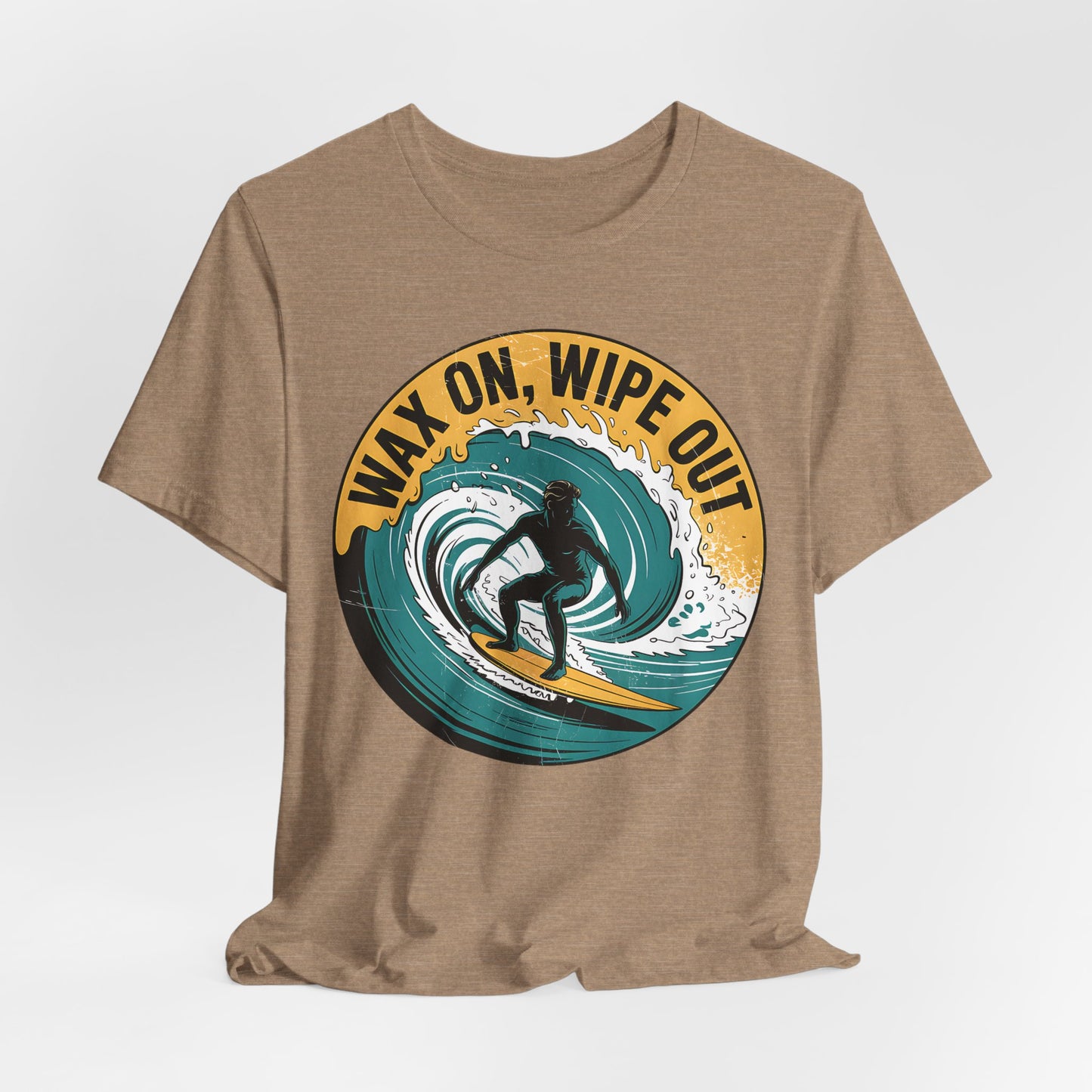 The Surfing Inspired Unisex Short Sleeve T-Shirt - Wax On, Wipe Out features a tan jersey fabric and a circular surfer graphic with bold yellow text—ideal for surf enthusiasts and beach lovers.