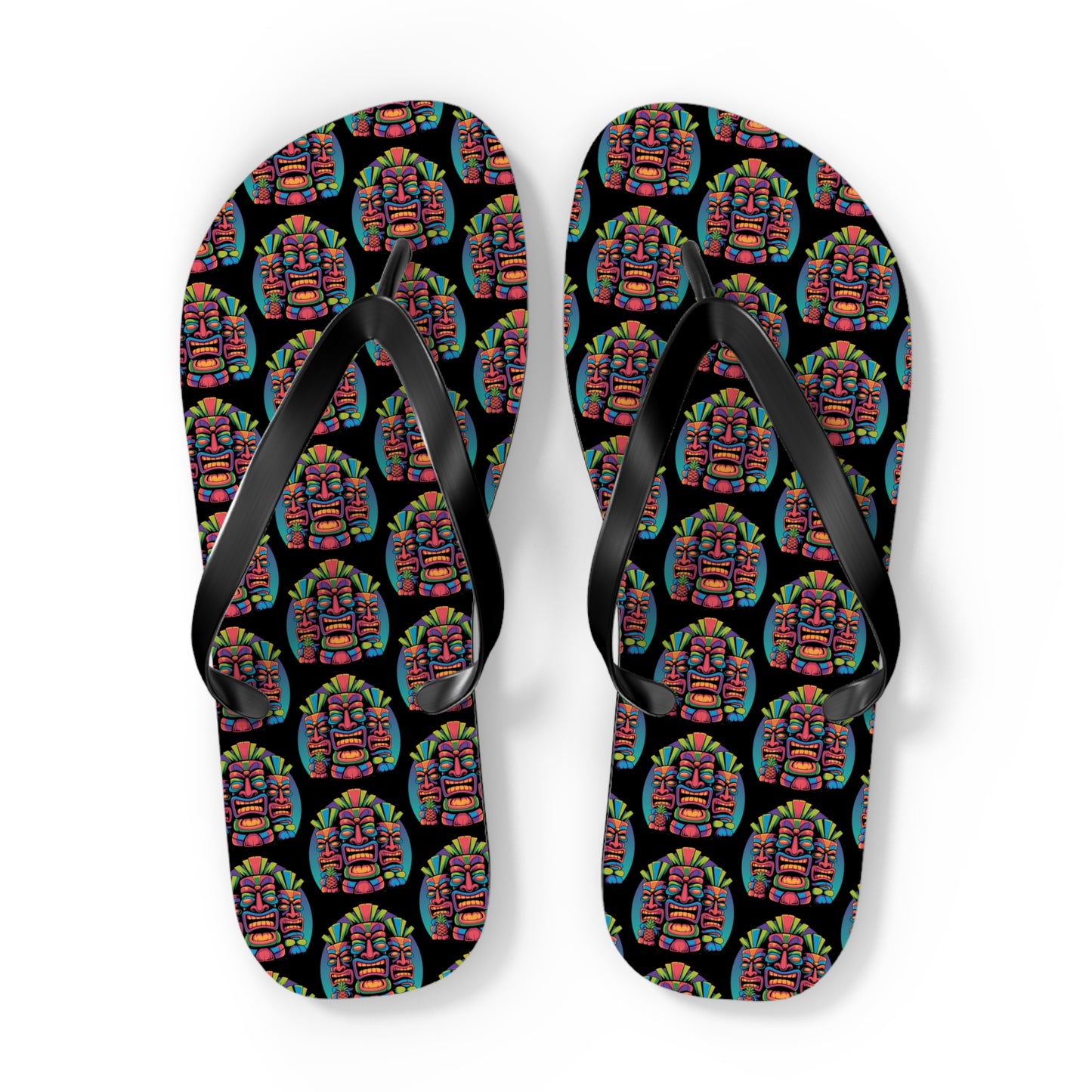 The Tropical Pineapple Flip Flops feature a lively pineapple print on the footbeds with solid black straps, making them perfect summer accessories to brighten up your beachwear collection.