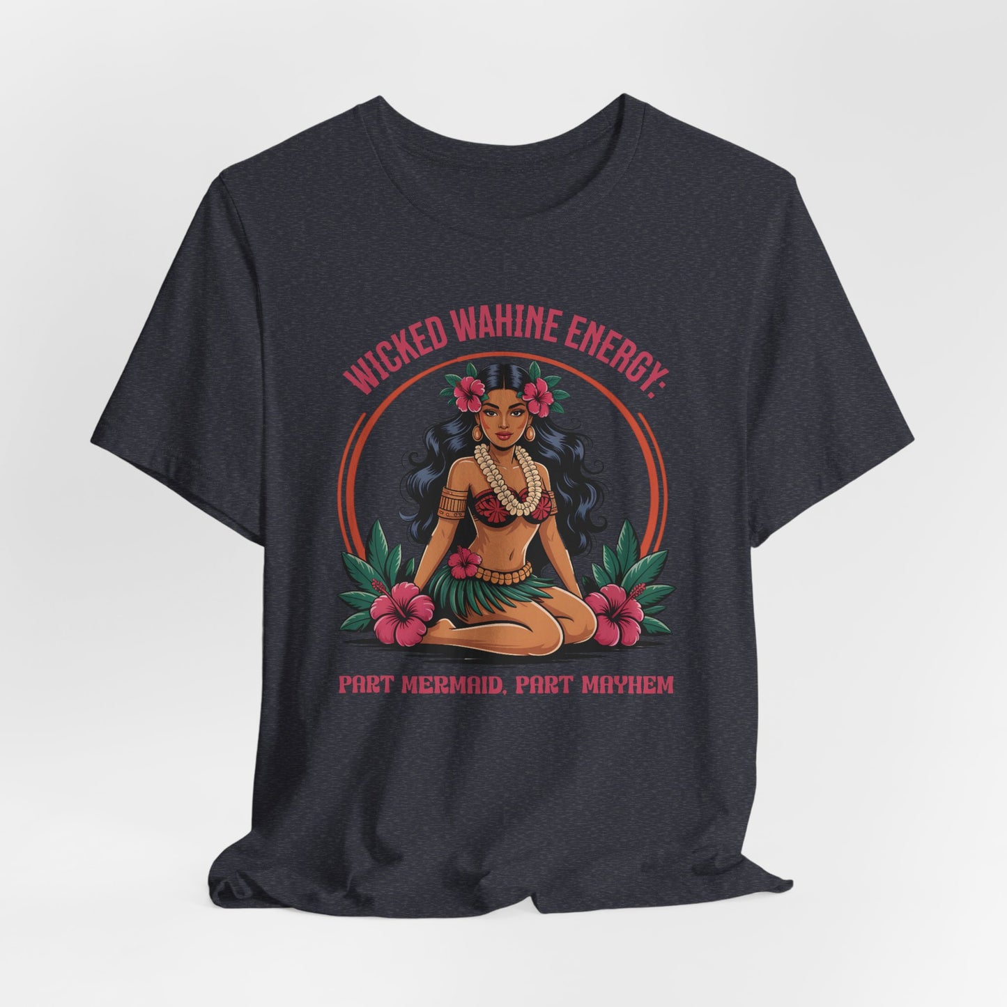 The Wicked Wahine Energy Unisex Tee - Part Mermaid, Part Mayhem is a black jersey shirt featuring an illustrated tropical woman with flowers and a lei. Wicked Wahine Energy appears above, and Part Mermaid, Part Mayhem below.