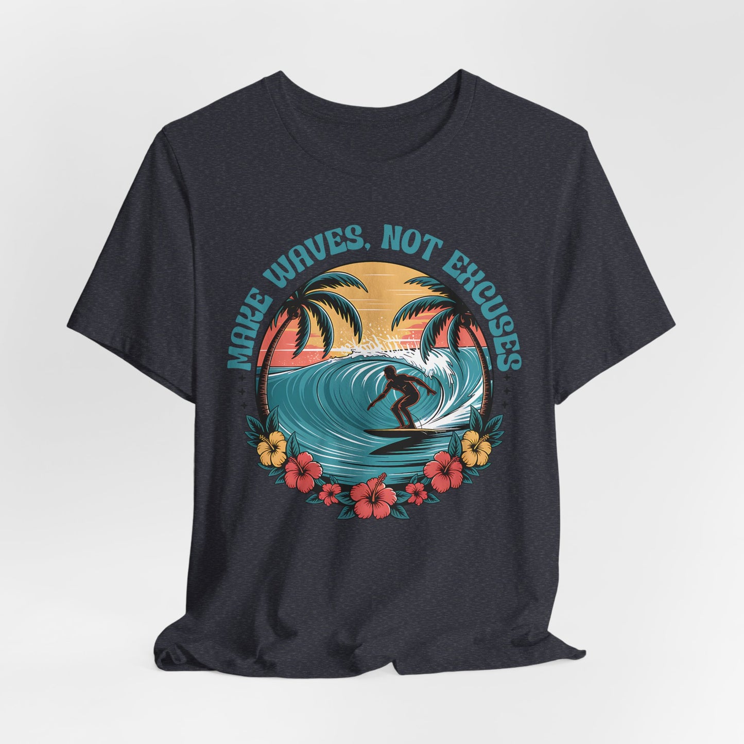 The Surf Tee - Make Waves Not Excuses - Inspirational T-Shirt features a surfer between sunset palms, hibiscus flowers, and the phrase “MAKE WAVES, NOT EXCUSES”—a perfect motivational choice for beach trips.
