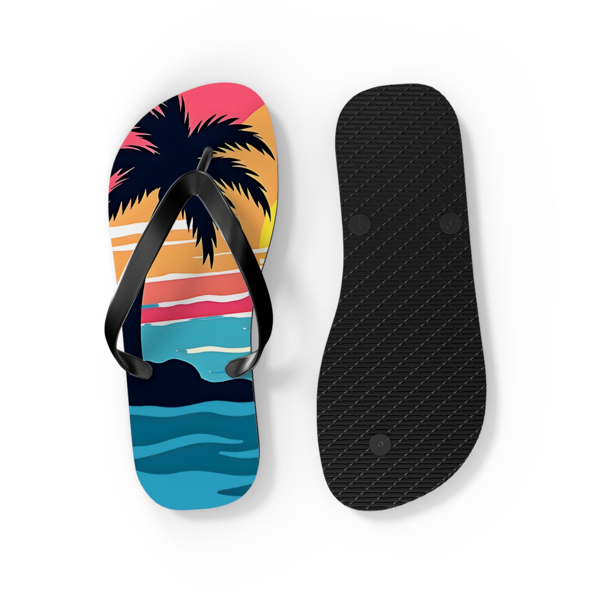 Tropical Sunset Flip Flops | Beach Vibes Sandals—one displays a vibrant sunset with palm tree and waves; the other shows a sleek black sole. Both are on a white background, making them ideal for summer outfits.