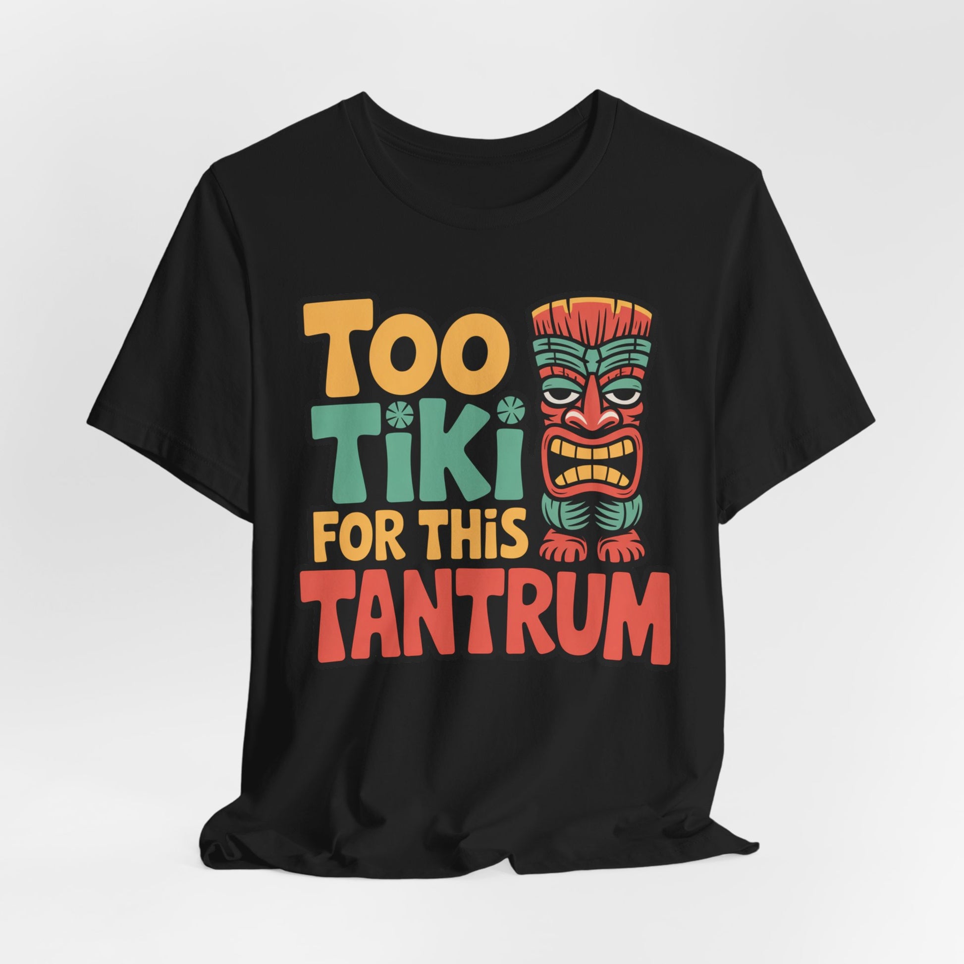The Tiki Tantrum T-Shirt is a fun unisex jersey tee for tropical vibes and celebrations, showcasing the bold Too Tiki For This Tantrum text and a tiki face on breathable fabric—perfect for all-day comfort.