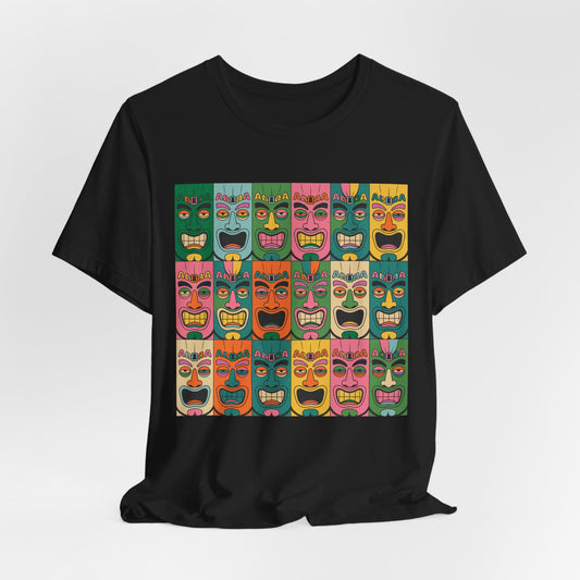 The Vibrant Tribal Mask Unisex Tiki T-Shirt is a black tee with a colorful grid of cartoonish tiki faces in red, yellow, pink, green, blue, and orange. Eco-friendly manufacturing ensures sustainable style.